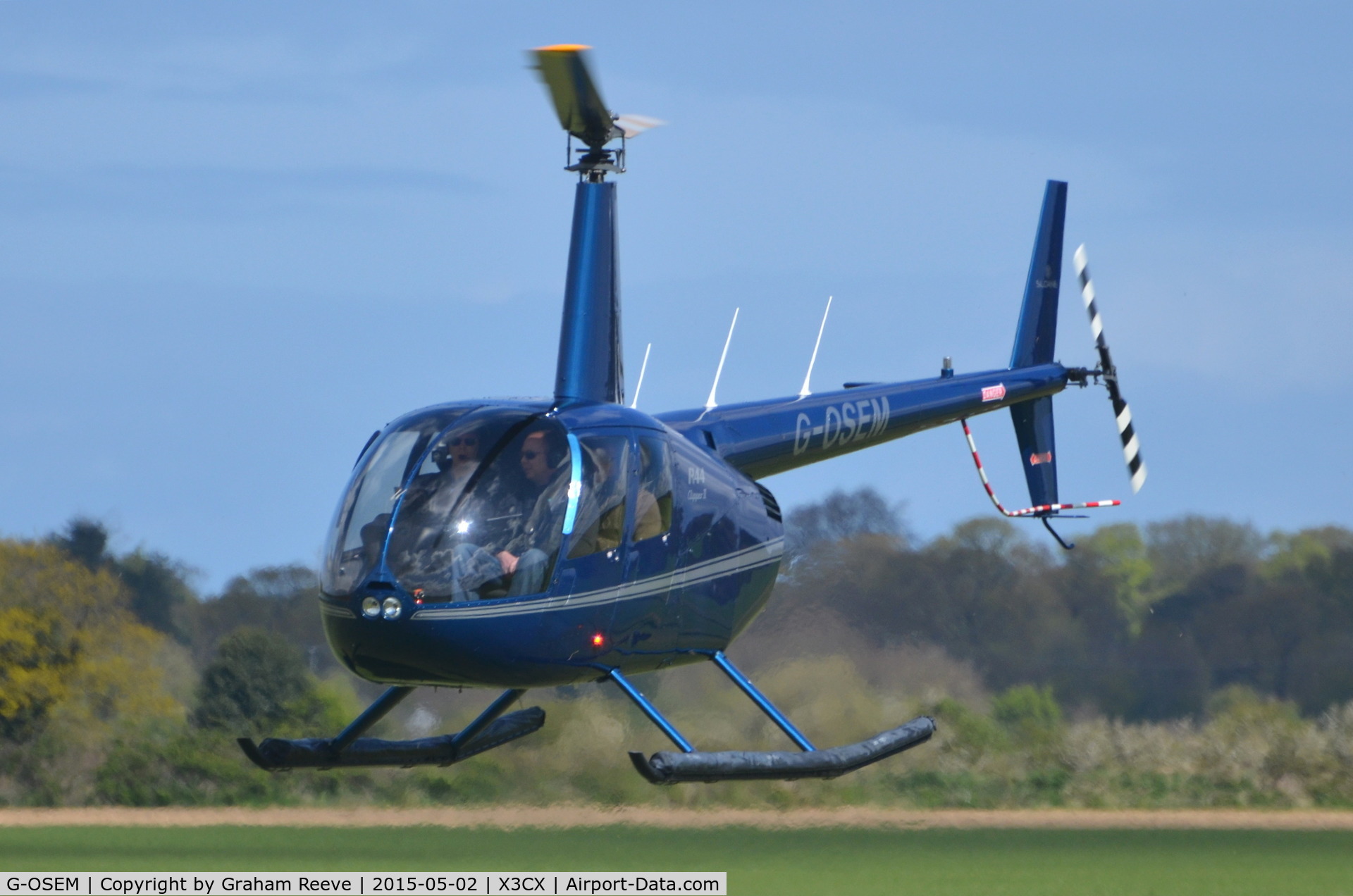 G-OSEM, 2014 Robinson R44 Clipper II C/N 13665, About to land at Northrepps.