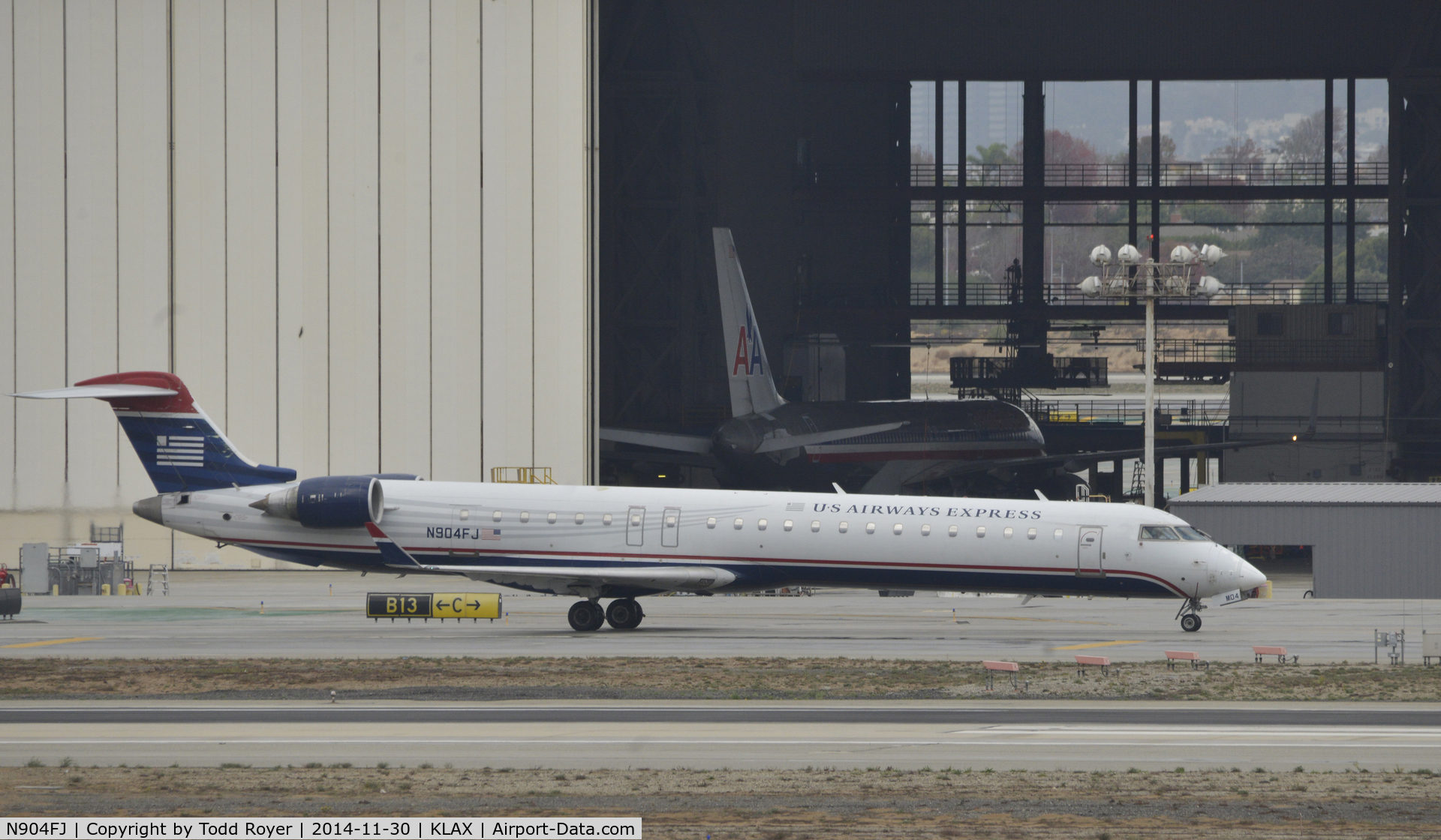 N904FJ, 2003 Bombardier CRJ-900ER (CL-600-2D24) C/N 15004, Taxiing to gate at LAX