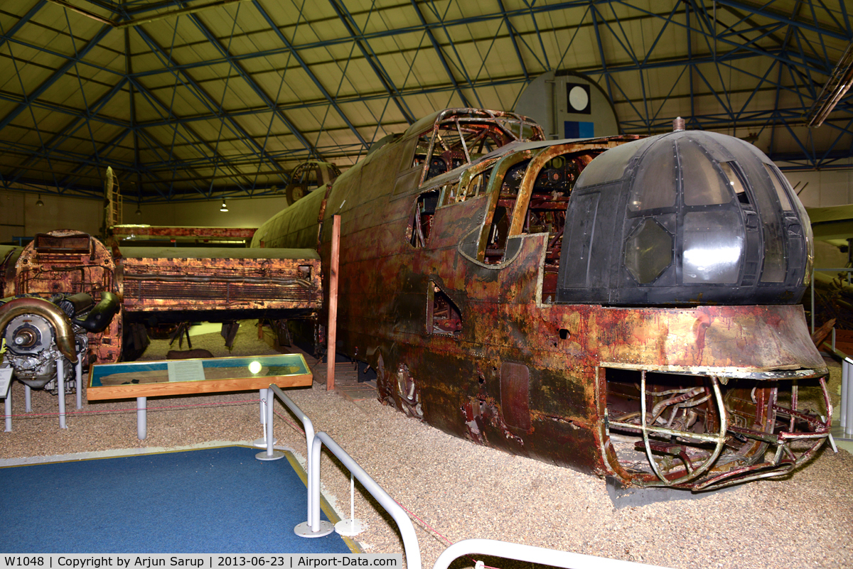 W1048, Handley Page Halifax II C/N 11, No. 35 Sqn. RAF Halifax lost on its first operational sortie on 28.04.42 against KMS Tirpitz. Hit by flak, the Halifax was put down on a frozen lake in Norway. Recovered in 1973 and now on display in the Bomber Hall at RAF Museum Hendon.