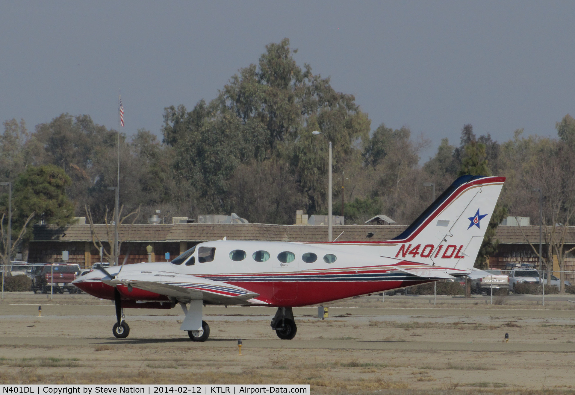 N401DL, 1979 Cessna 421C Golden Eagle C/N 421C0813, Blue Star Gas Fleet Services (Central Point, OR) Cessna 421C taxis in @ Mefford Field (Tulare, CA) for 2014 International Ag Expo