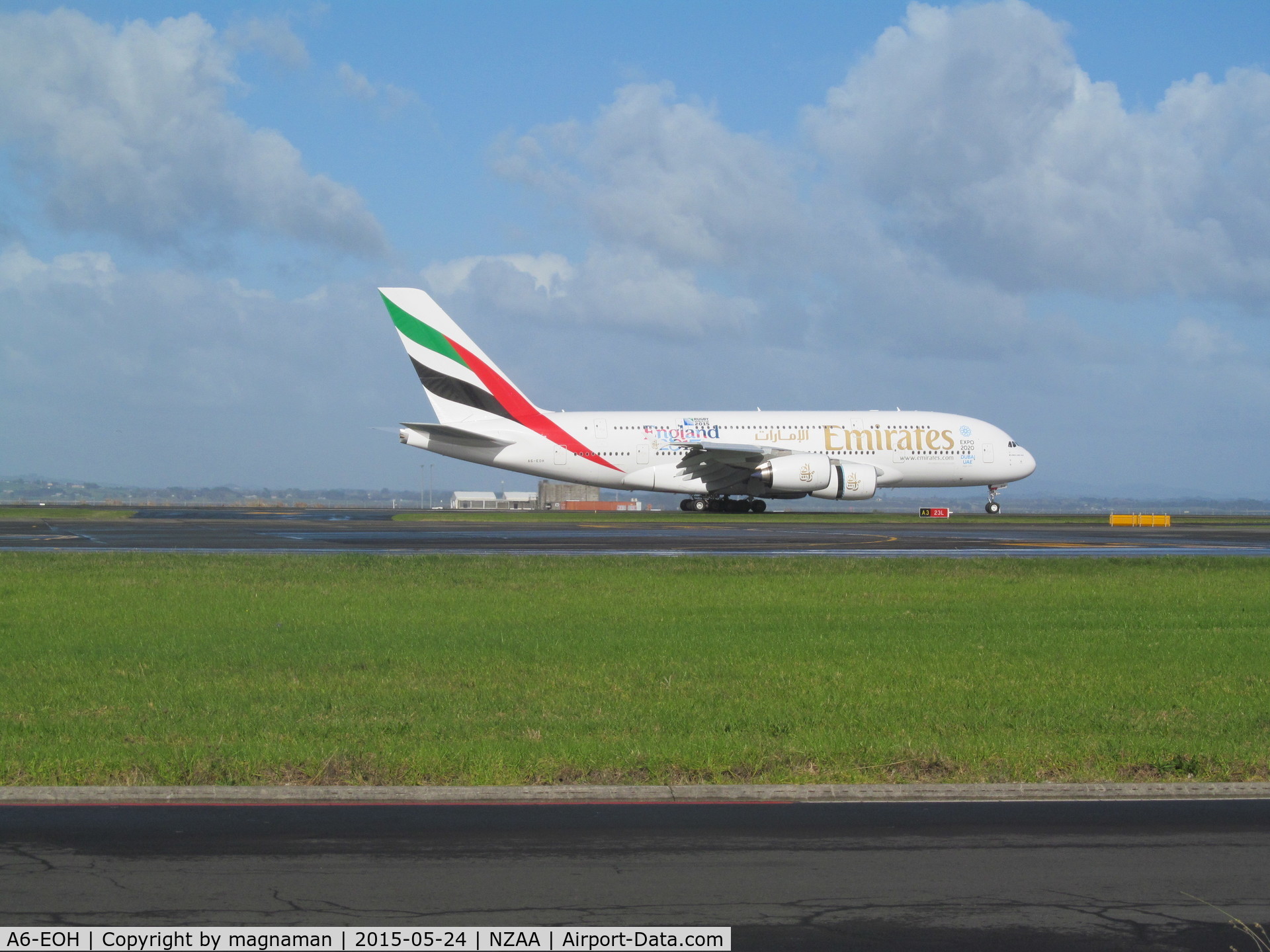 A6-EOH, 2014 Airbus A380-861 C/N 174, Touching down at AKL - with rugby world cup titles