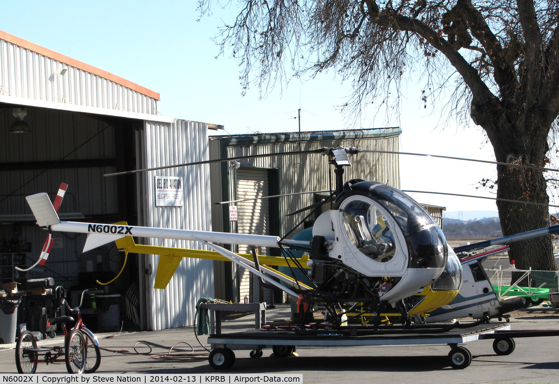 N6002X, 1993 Schweizer 269C-1 C/N 0001, Del Rio Aviation Schweizer 269C-1 ready to return to hangar @ Paso Robles Municipal Airport, CA [sold to fishing company in Mexico for fish spotting activities in late summer 2013]
