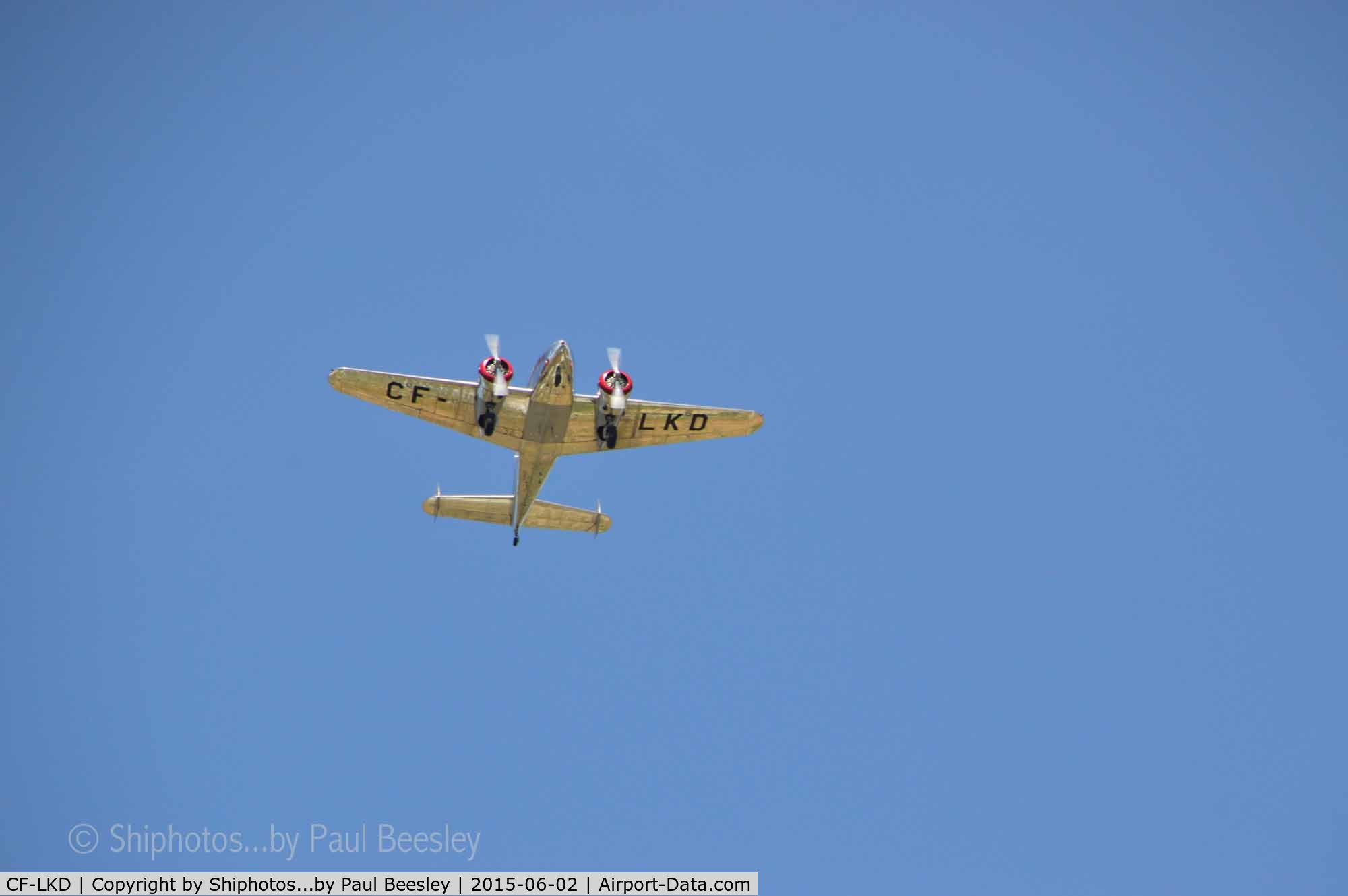 CF-LKD, 1937 Lockheed 12A Electra Junior C/N 1222, Flying over the Welland Canal, St Catharines, Ontario, Canada.  June 2, 2015