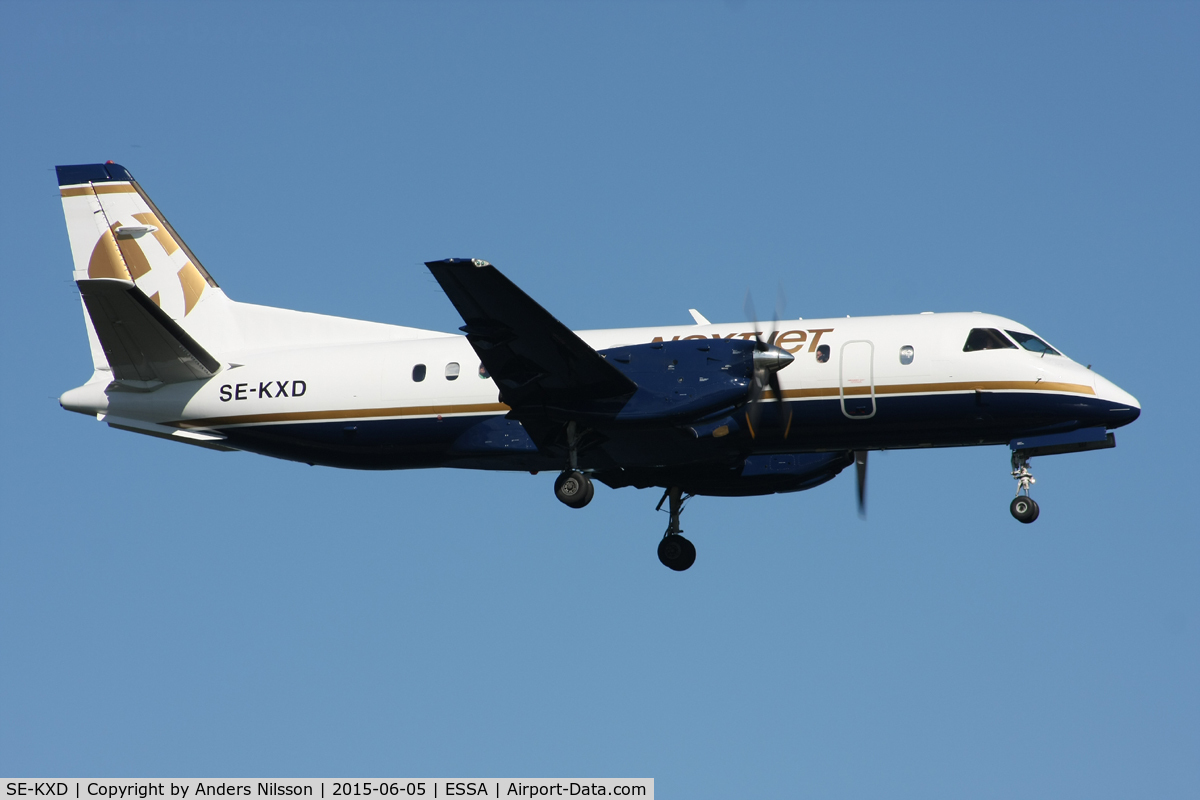 SE-KXD, 1991 Saab 340B C/N 340B-248, On short final for runway 19L.