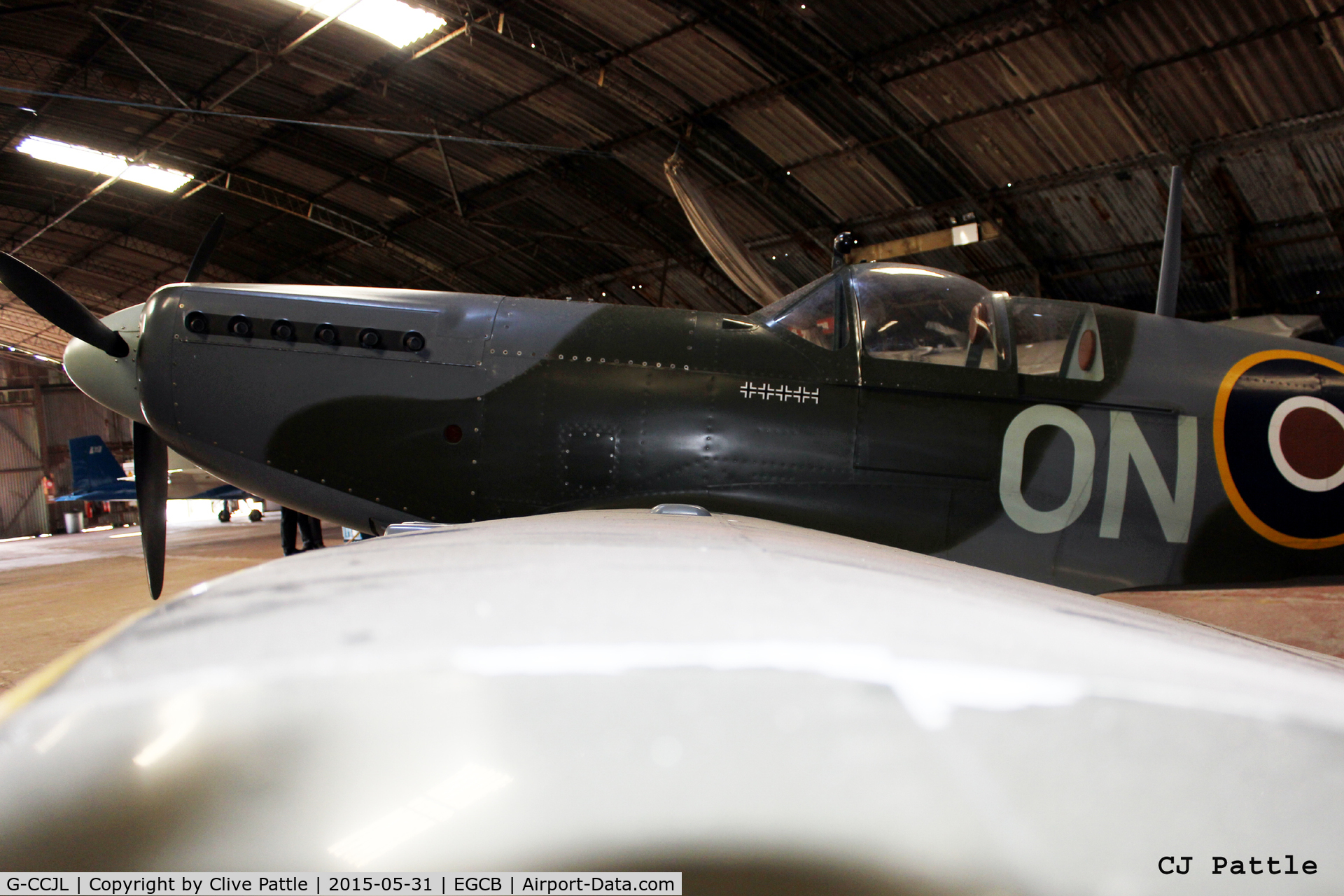 G-CCJL, 2007 Supermarine Aircraft Spitfire Mk.26 C/N PFA 324-14053, Viewed from an unusual angle whilst hangared at Barton Airfield, Manchester - EGCB