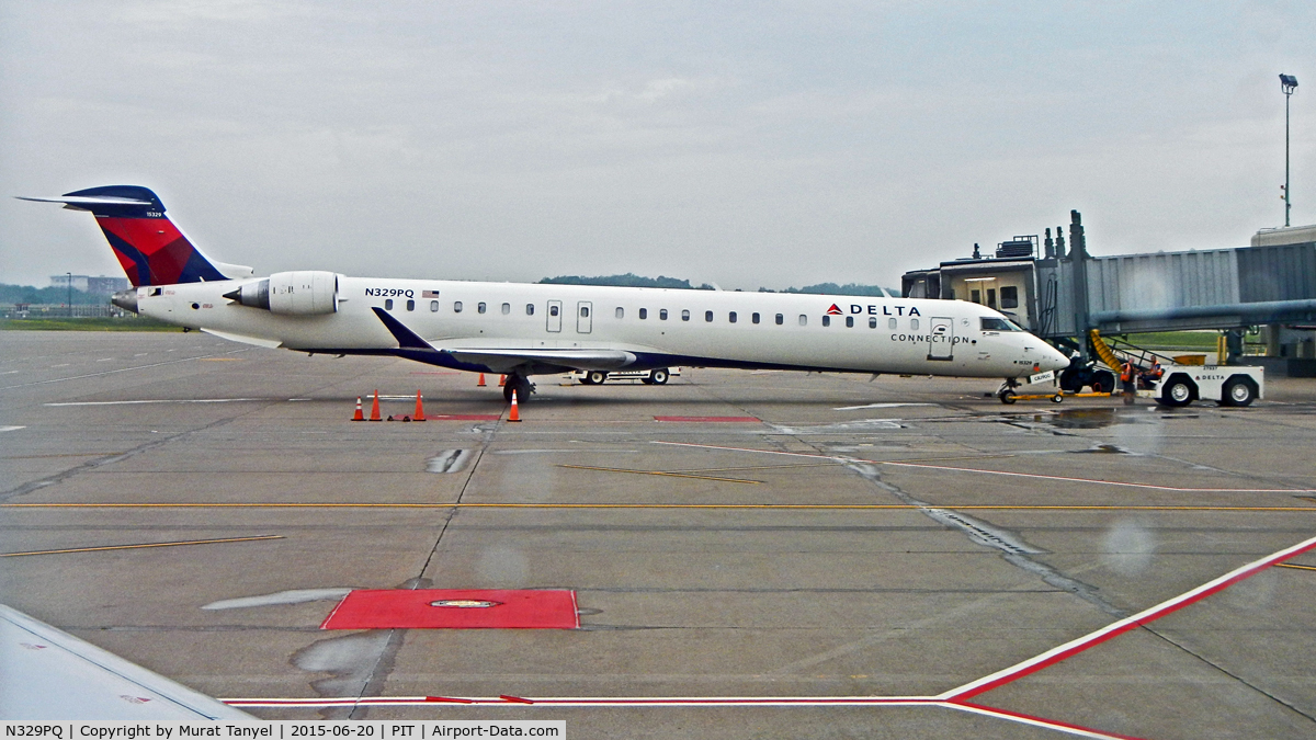 N329PQ, 2014 Bombardier CRJ-900 (CL-600-2D24) C/N 15329, At gate at PIT.