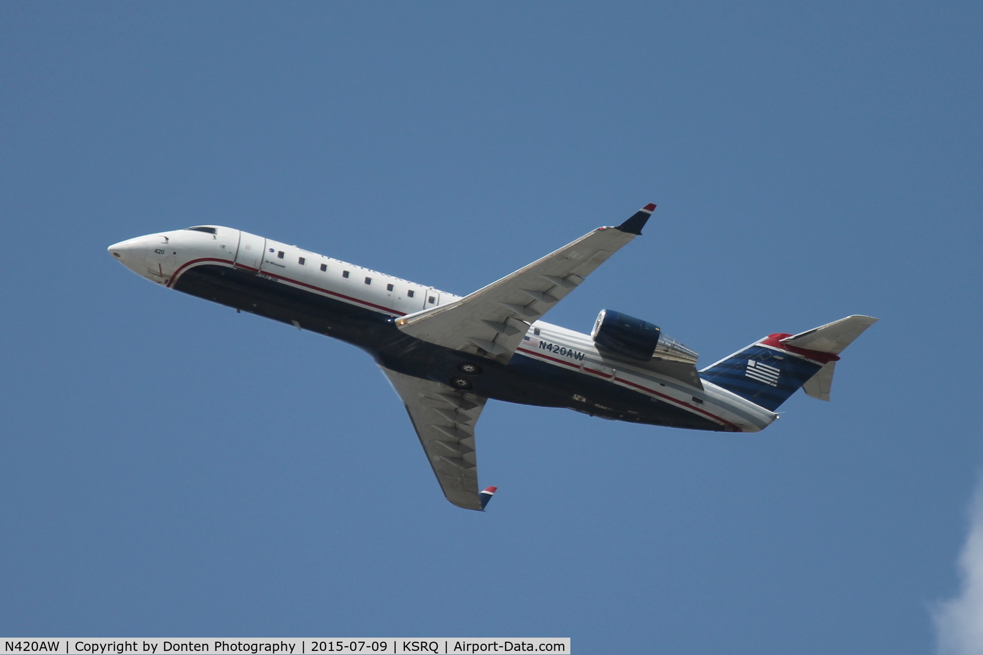 N420AW, 2002 Bombardier CRJ-200LR (CL-600-2B19) C/N 7640, American Flight 4024 operated by Air Wisconsin (N420AW) departs Sarasota-Bradenton International Airport enroute to Reagan National Airport