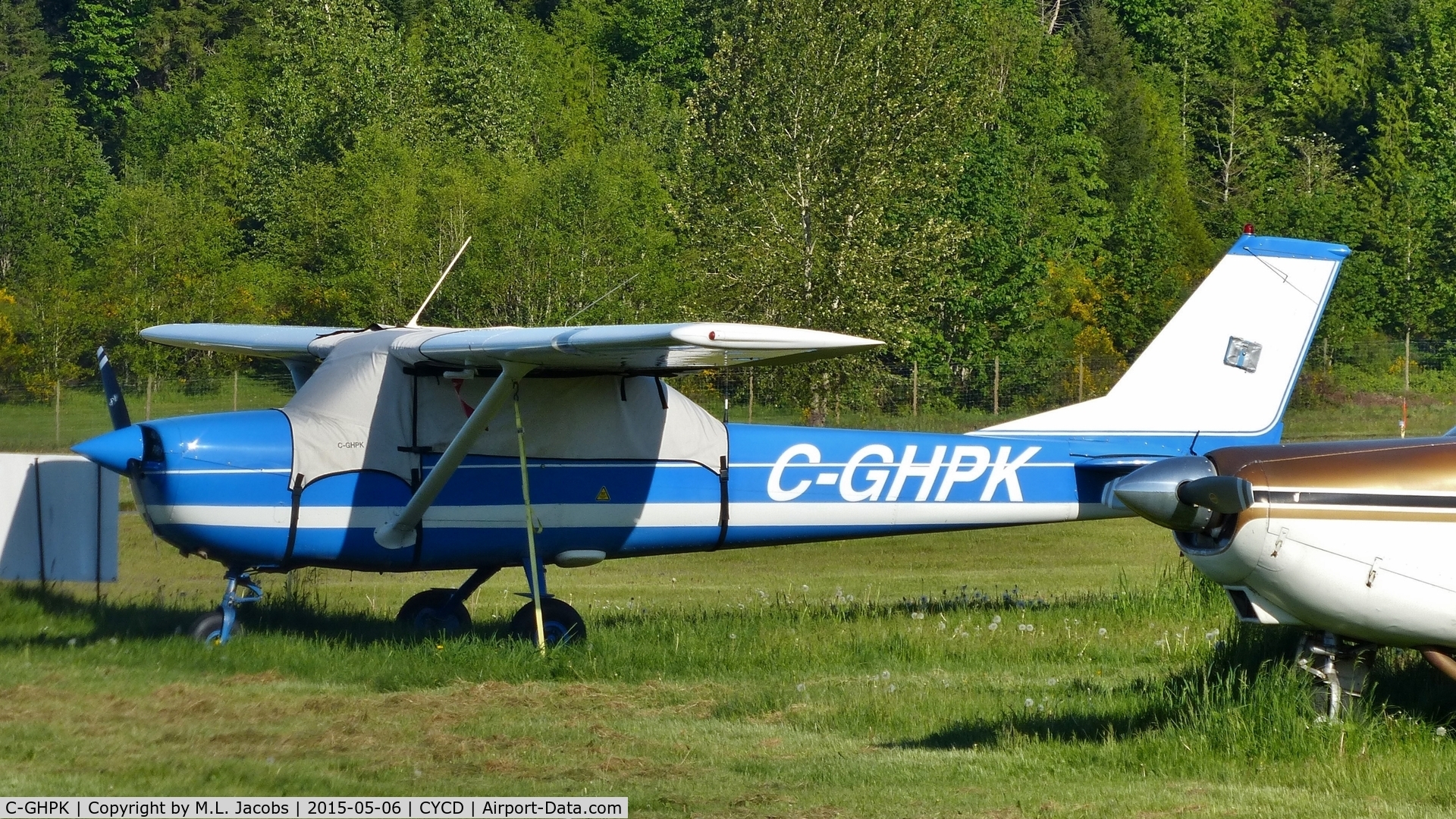 C-GHPK, 1967 Cessna 150H C/N 15067326, Parked in the grass field at Nanaimo airport.