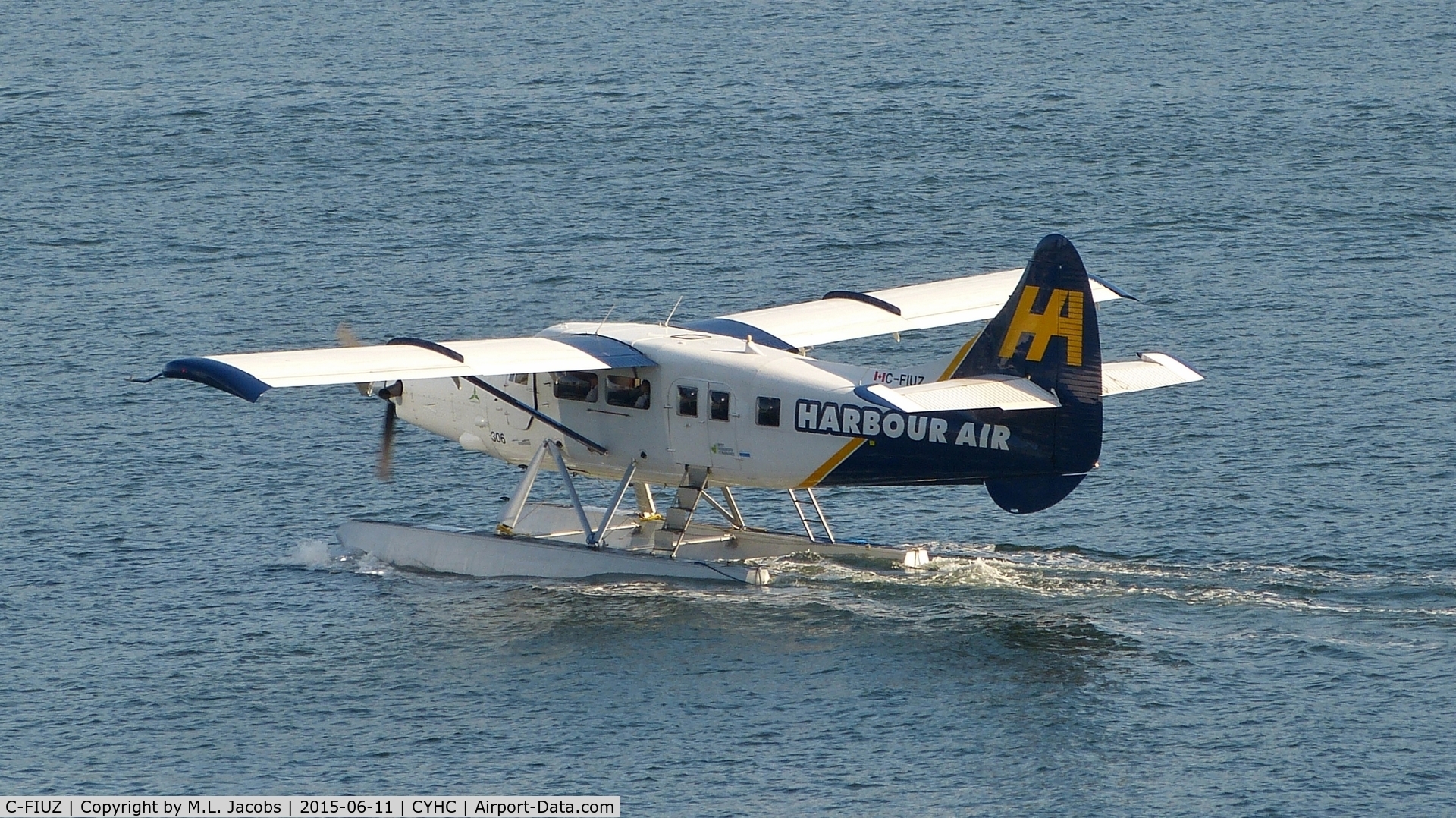 C-FIUZ, 1956 De Havilland Canada DHC-3T Vazar Turbine Otter C/N 135, Harbour Air #306 taxiing for an early morning departure from Coal Harbour.