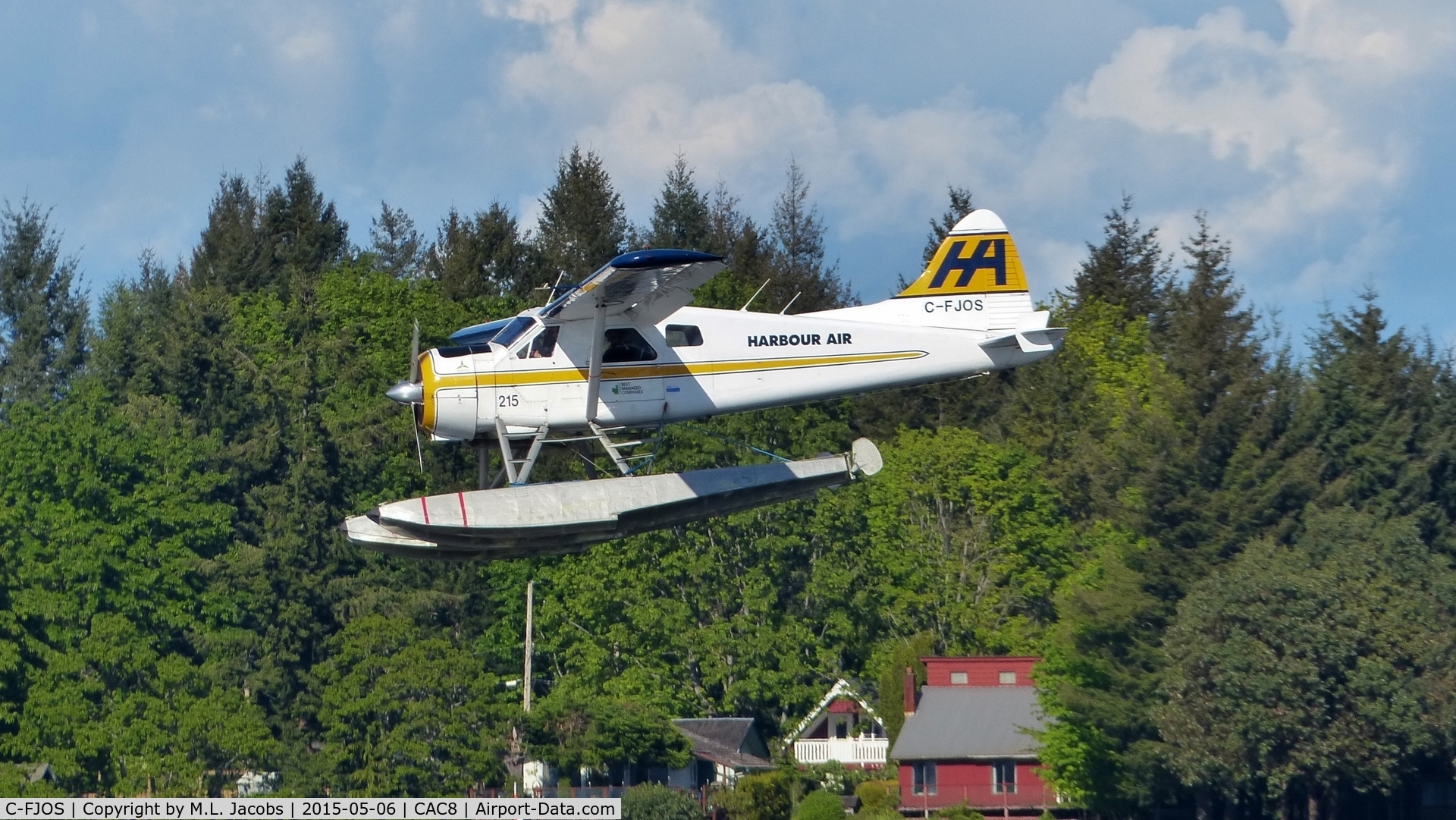 C-FJOS, 1956 De Havilland Canada DHC-2 Beaver Mk.1 C/N 1030, Harbour Air #215 coming in to land in Nanaimo Harbour.