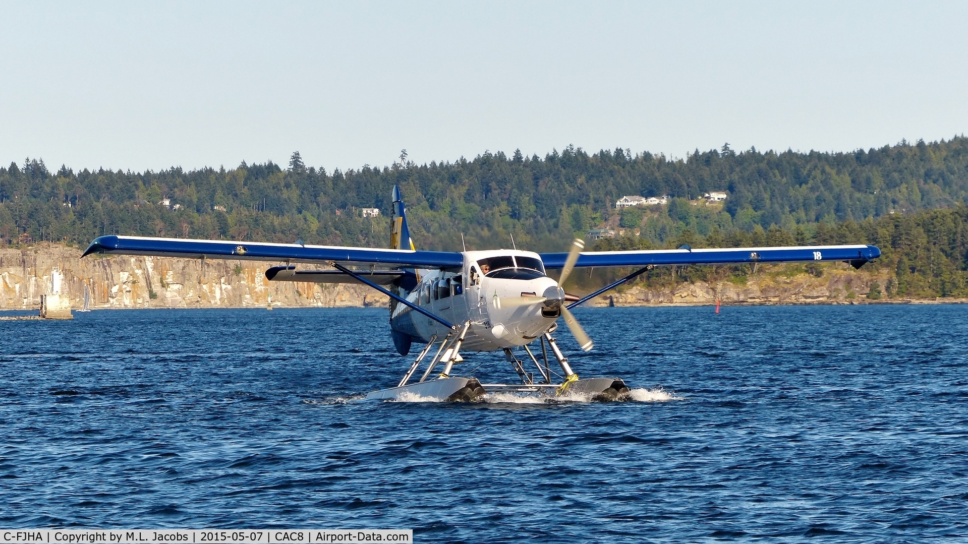 C-FJHA, 1960 De Havilland Canada DHC-3 Turbo Otter Otter C/N 393, Harbour Air #318 taxiing to Nanaimo Harbour terminal.