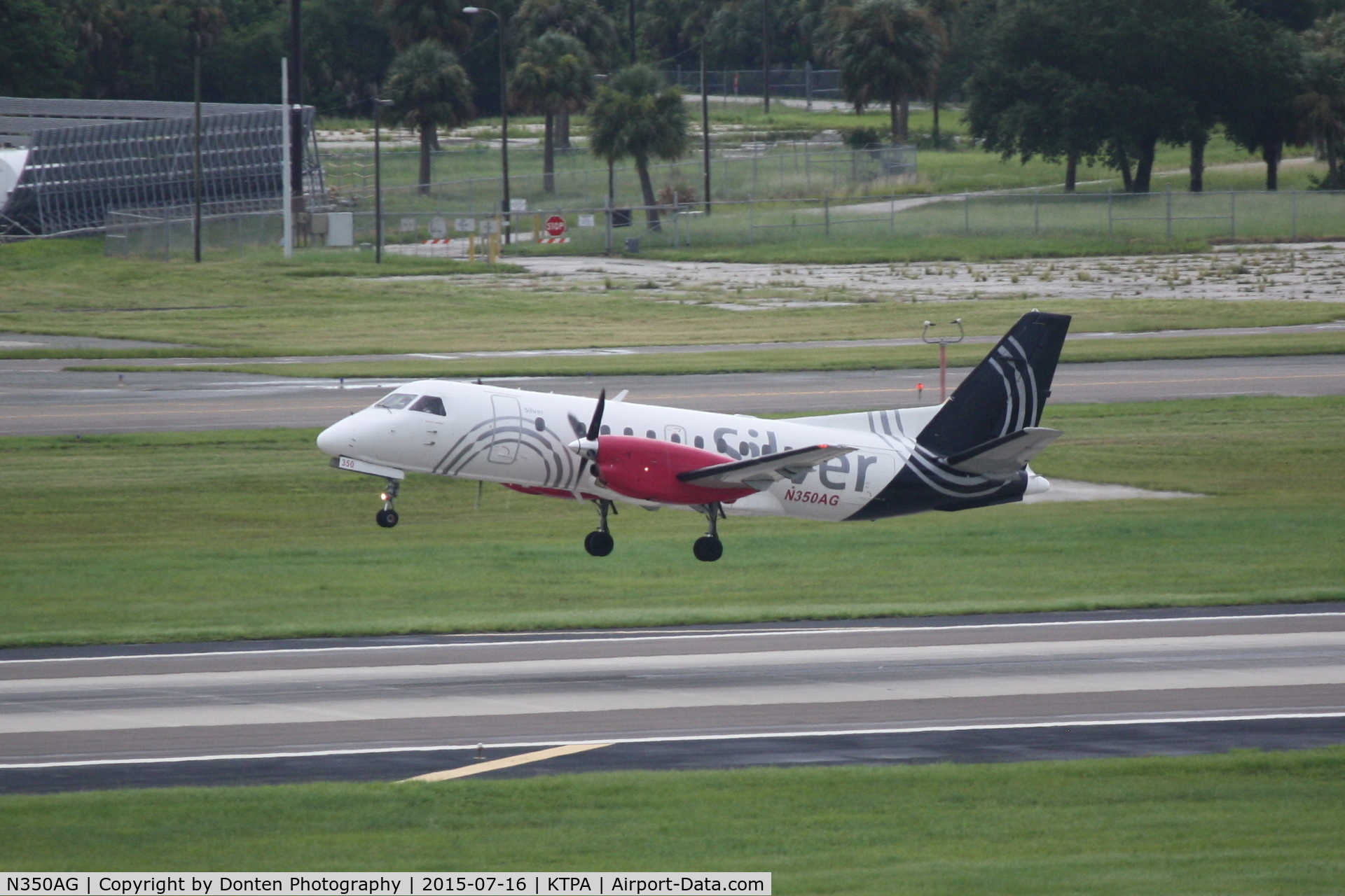 N350AG, 1998 Saab 340B+ C/N 340B-450, Silver Flight 93 (N350AG) departs Tampa International Airport enroute to Hollywood International Airport