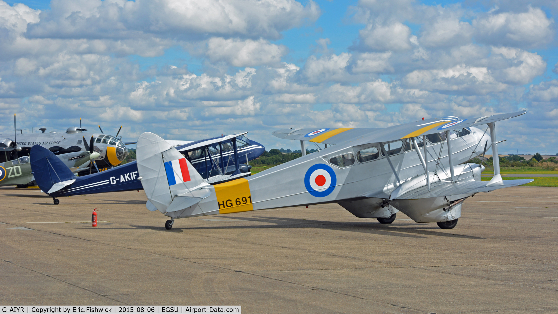 G-AIYR, 1943 De Havilland DH-89A Dominie/Dragon Rapide C/N 6676, 5. HG691 - a pair of DH-89A's taking a short break - but in great demand at Duxford during the Summer Holidays, 2015.