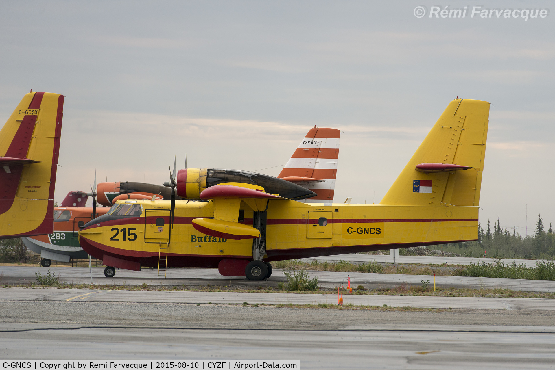 C-GNCS, 1969 Canadair CL-215-I (CL-215-1A10) C/N 1008, Parked for the day with seven others, after seeing action last night.