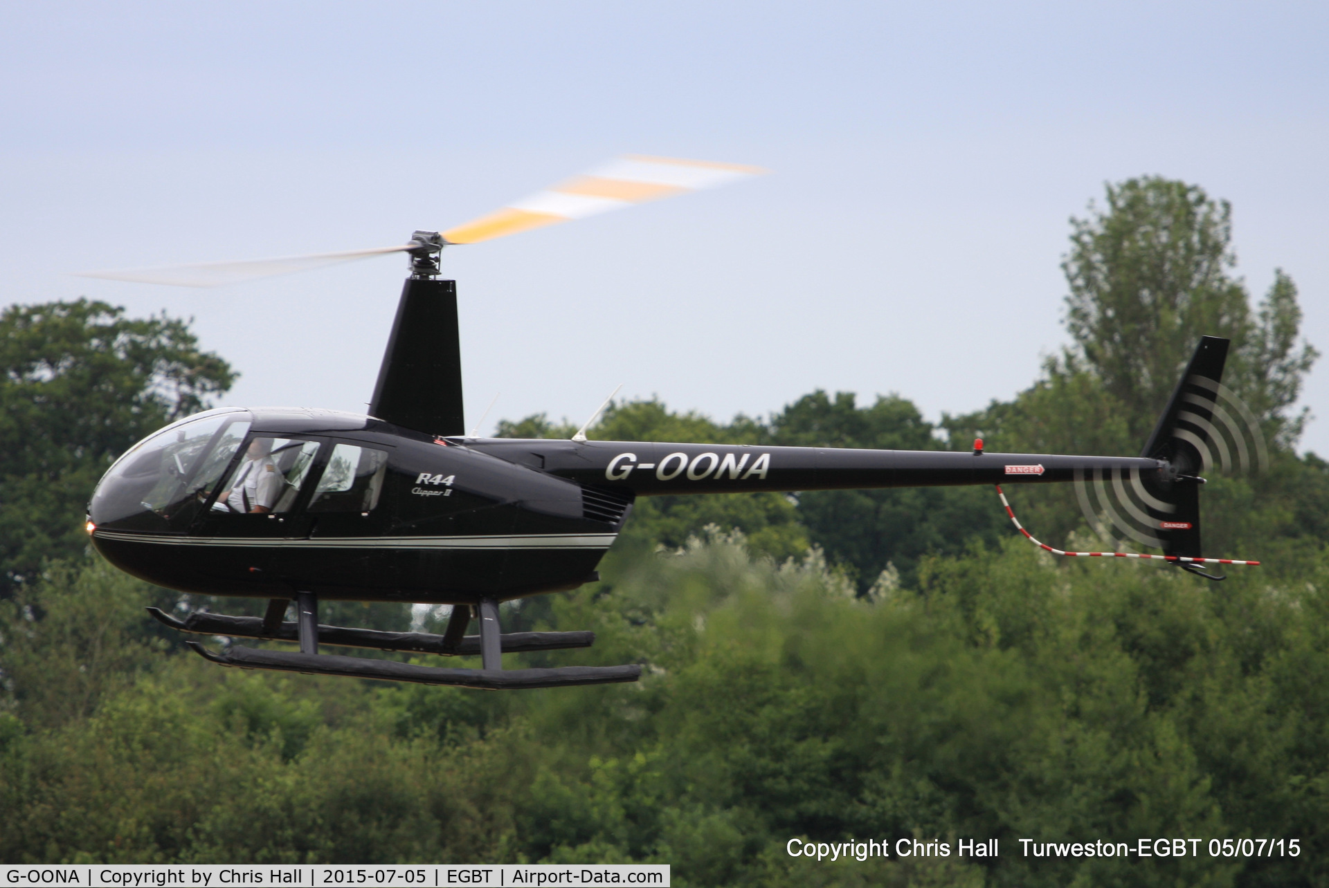 G-OONA, 2005 Robinson R44 Clipper II C/N 10907, ferrying race fans to the British F1 Grand Prix at Silverstone