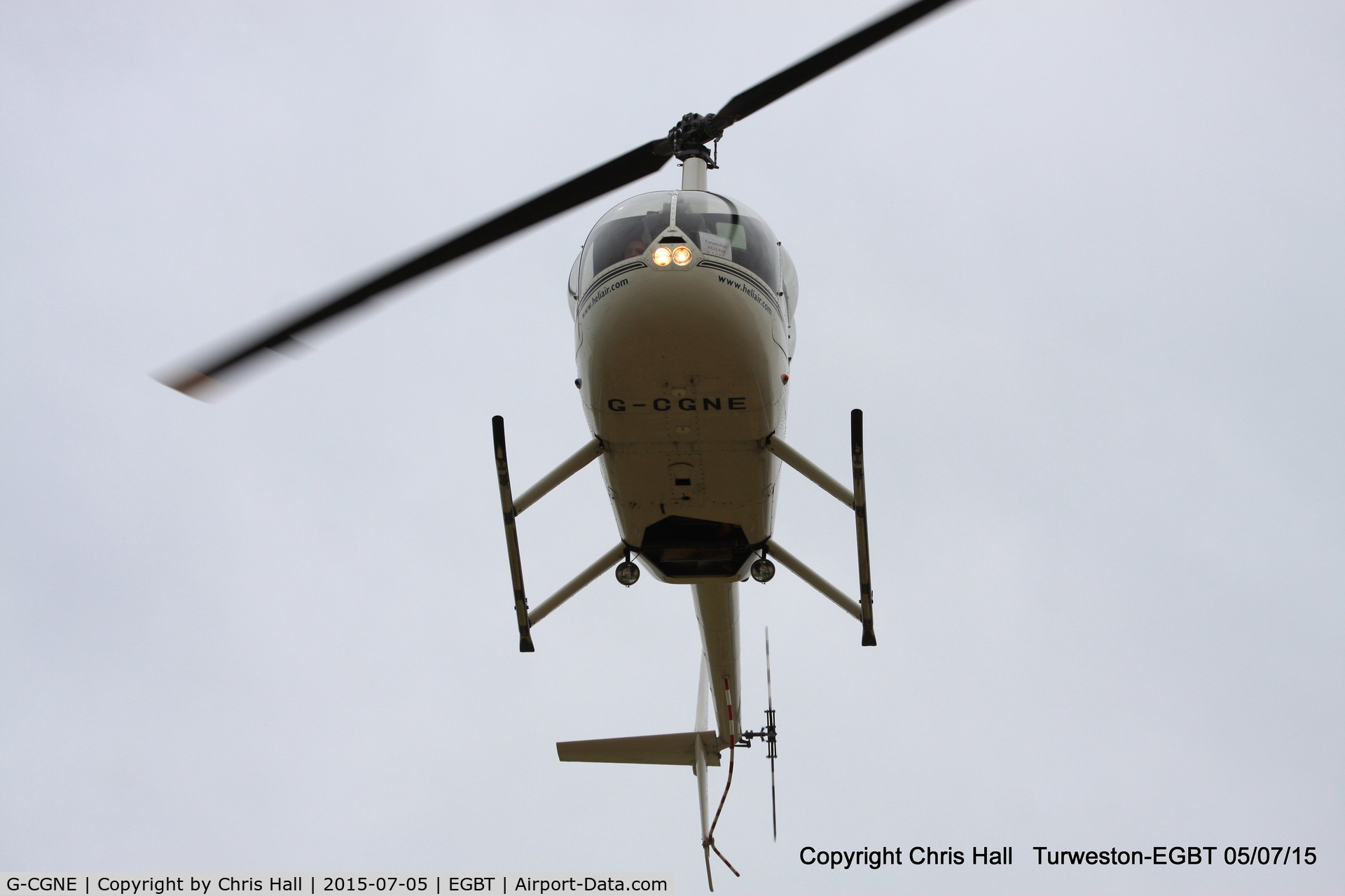 G-CGNE, 2010 Robinson R44 Raven II C/N 12952, ferrying race fans to the British F1 Grand Prix at Silverstone