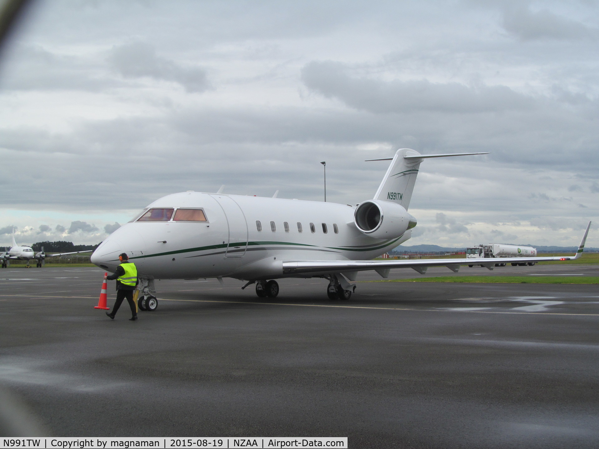 N991TW, 1997 Canadair Challenger 604 (CL-600-2B16) C/N 5333, on stand (through wire fence!)