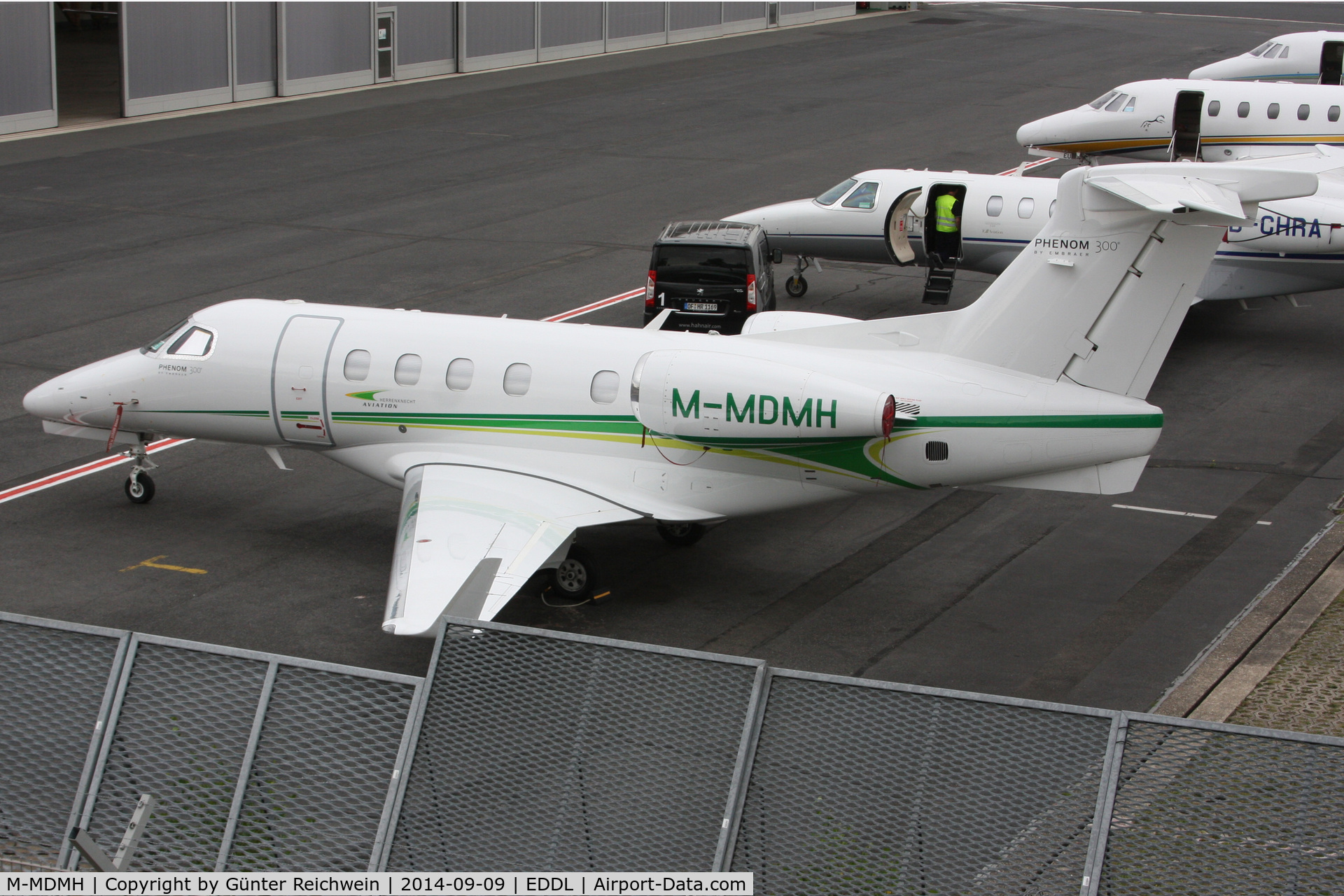 M-MDMH, 2012 Embraer EMB-505 Phenom 300 C/N 50500116, At General Aviation Terminal