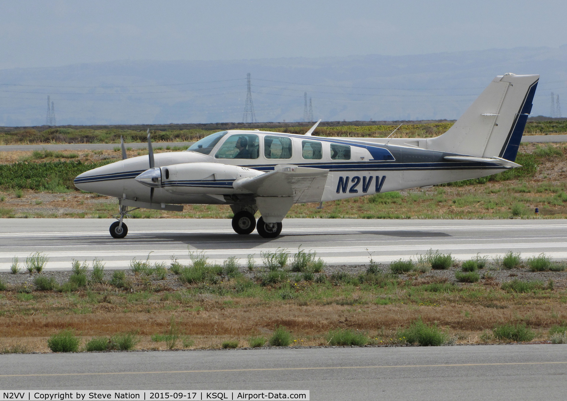 N2VV, 1976 Beech 58TC Baron C/N TK-37, Redding, CA-based 1976 Beech 58TC begins takeoff roll for KLVT (Livermore, CA) @ San Carlos Municipal Airport, CA