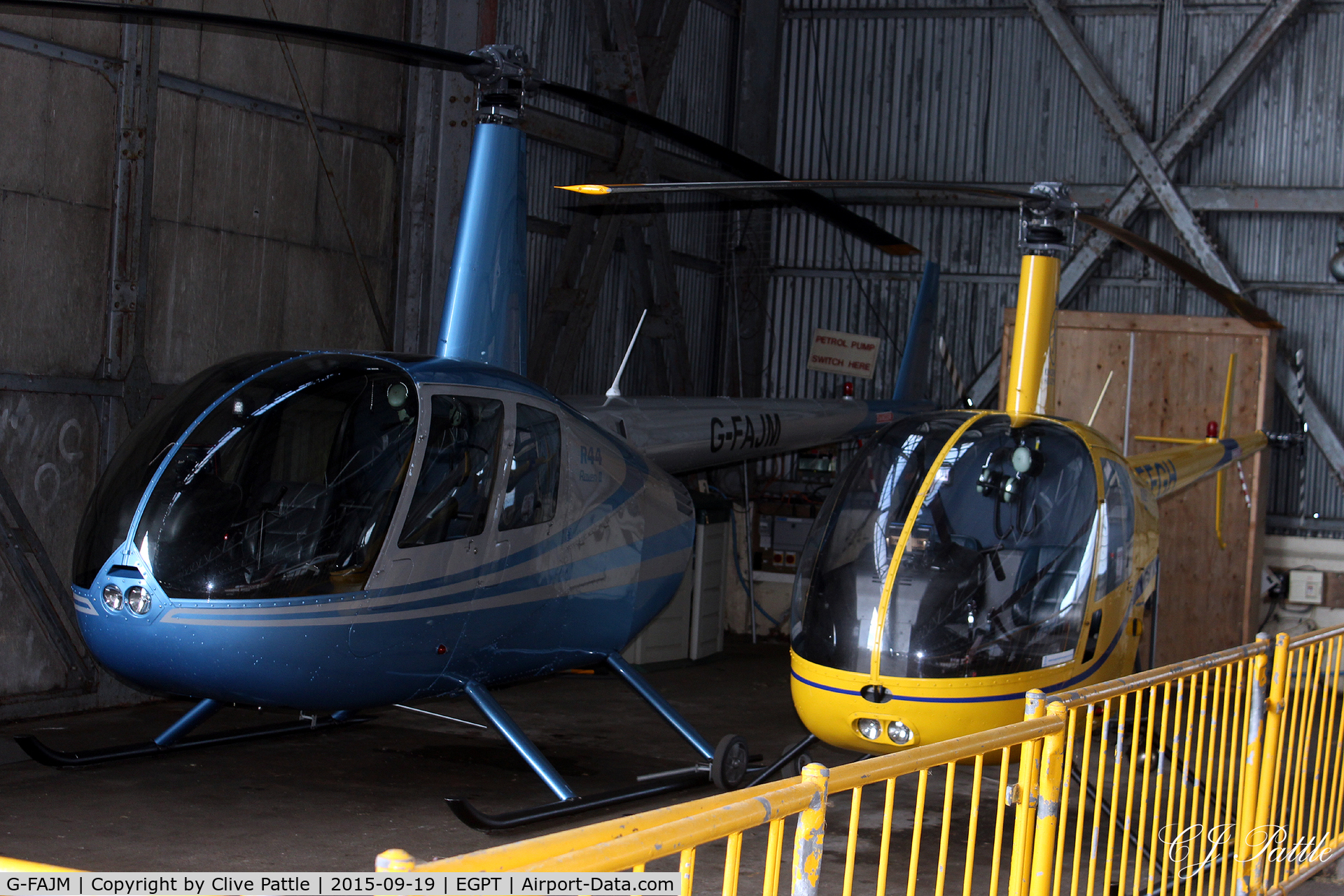 G-FAJM, 2008 Robinson R44  Raven II C/N 12394, Hangared at Perth EGPT in cramped conditions alongside based stablemate G-EFGH