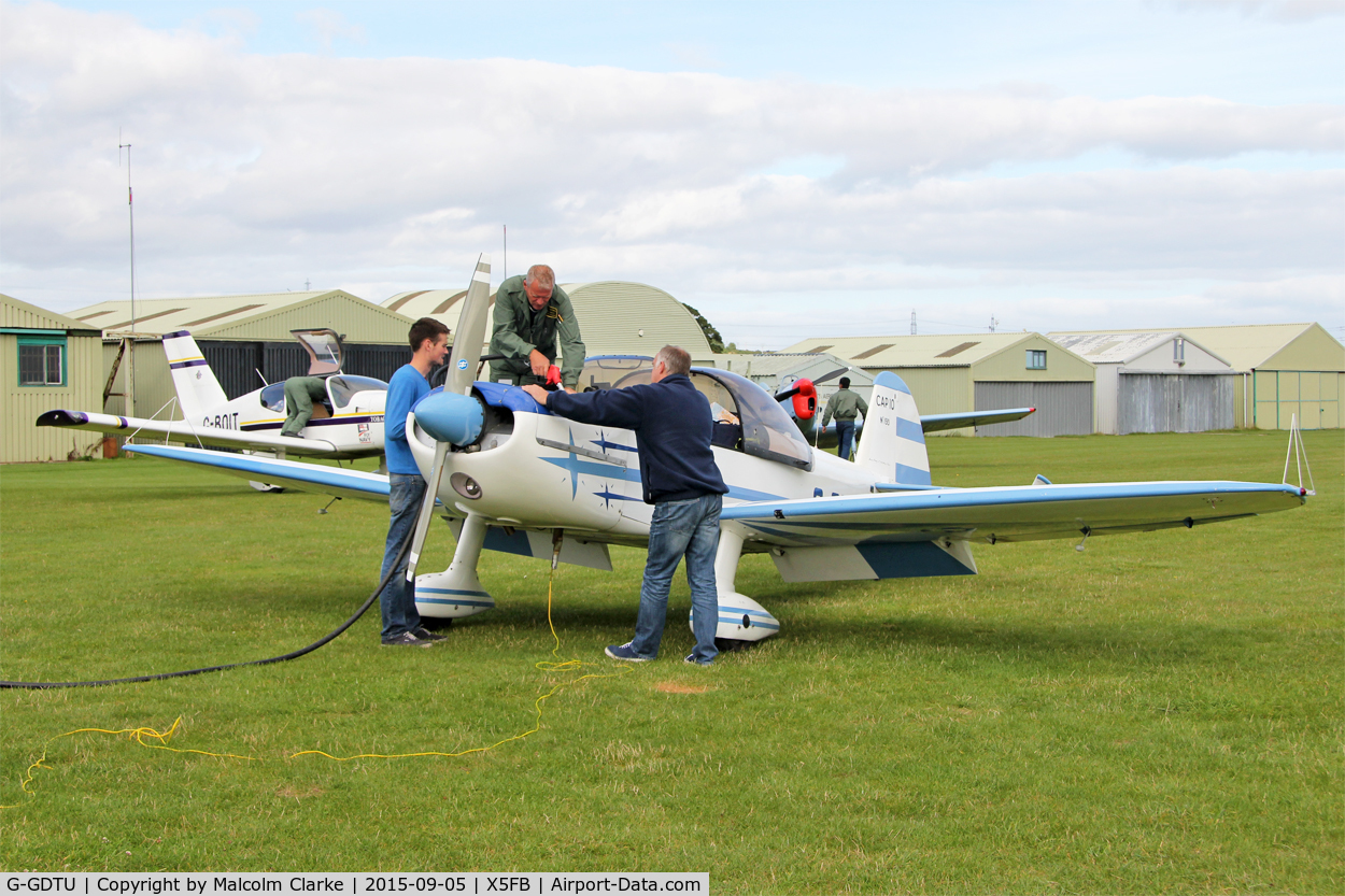 G-GDTU, 1983 Mudry CAP-10B C/N 193, All hands to the pumps for this Mudry CAP-10B, Fishburn Airfield, September 5th 2015.