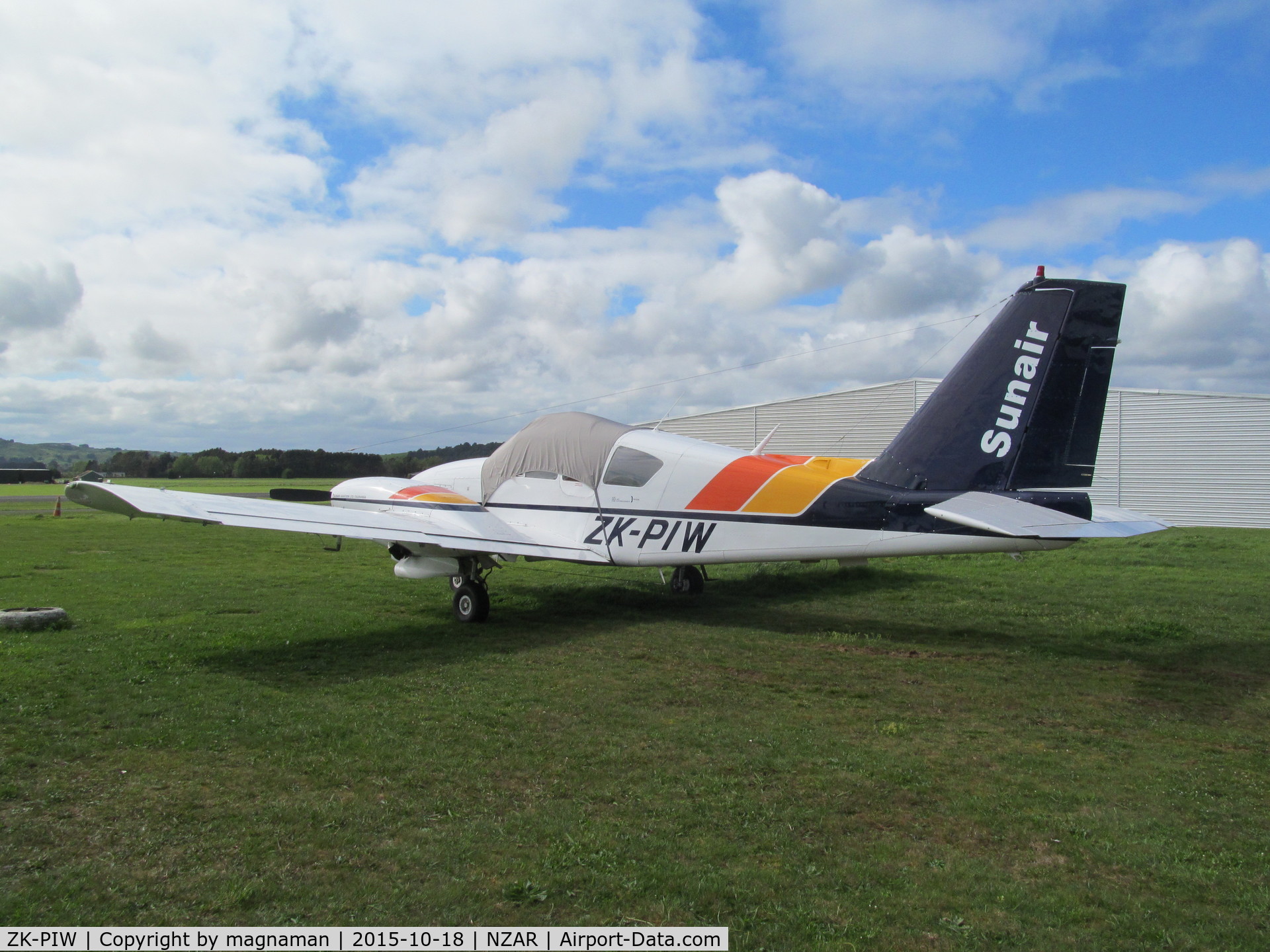 ZK-PIW, Piper PA-23-250 Aztec C/N 27-7305089, on grass at ardmore