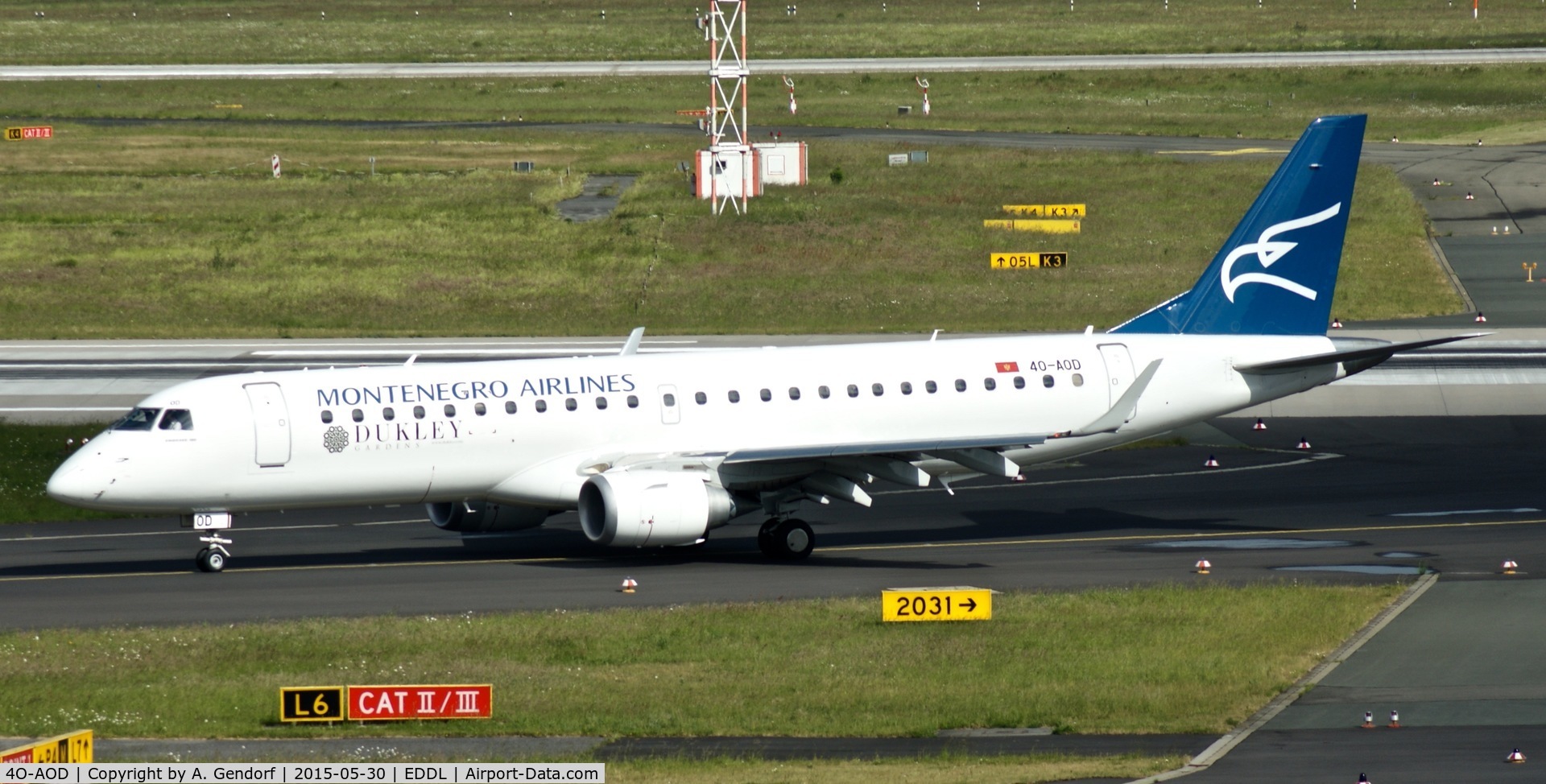4O-AOD, 2014 Embraer 190LR (ERJ-190-100LR) C/N 19000665, Montenegro Airlines, is here taxiing at Düsseldorf Int'l(EDDL)
