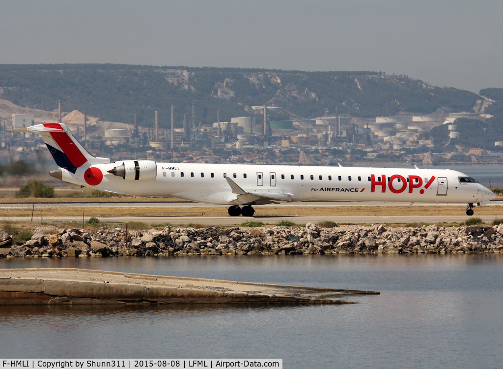 F-HMLI, 2011 Bombardier CRJ-1000EL NG (CL-600-2E25) C/N 19014, Taxiing holding point rwy 13L for departure...