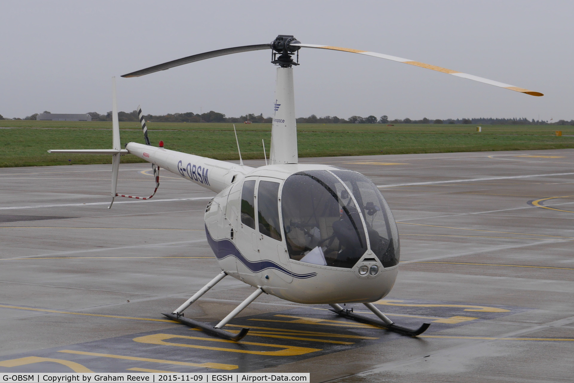 G-OBSM, 2001 Robinson R44 Raven C/N 1030, Parked at Norwich.