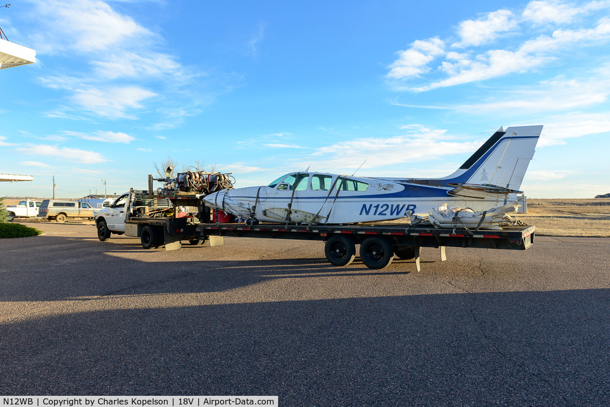 N12WB, 1969 Beech 56TC C/N TG-82, An eye witness told me after fully fueling up it crashed on takeoff on 11/22/2015. Evidently one of the doors was open and a startled pilot tried to go around & land after gaining 300 feet. He banked and over corrected. A family of 6 nobody was hurt.