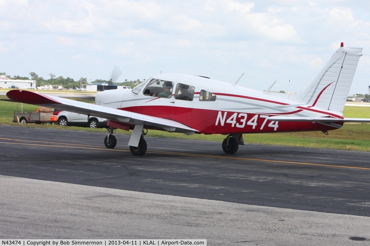 N43474, 1974 Piper PA-28R-200 Cherokee Arrow C/N 28R-7435273, Departing Lakeland, FL during Sun N Fun 2013