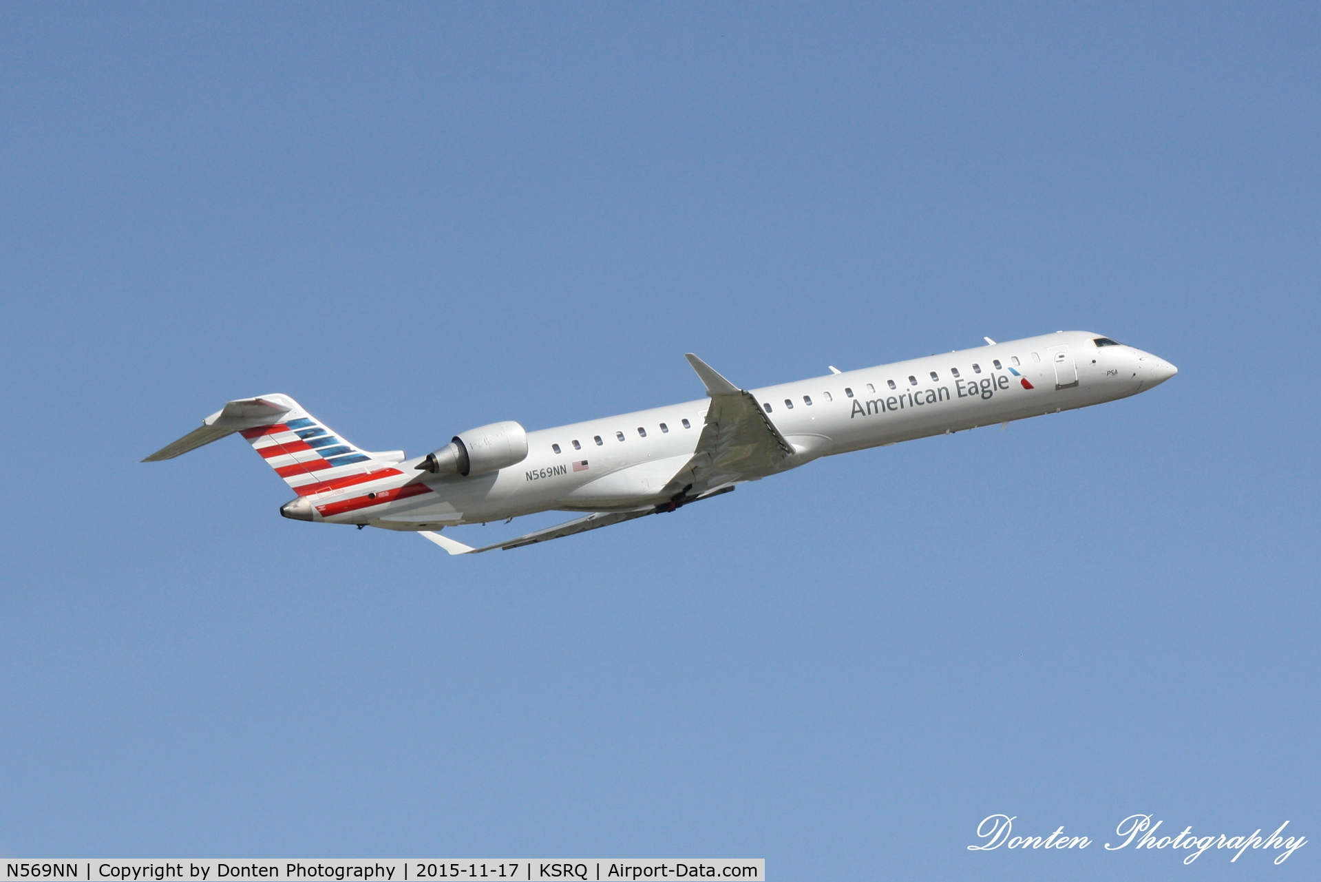 N569NN, 2015 Bombardier CRJ-900 (CL-600-2D24) C/N 15356, American Flight 5139 operated by PSA (N569NN) departs Sarasota-Bradenton International Airport enroute to Charlotte-Douglas International Airport