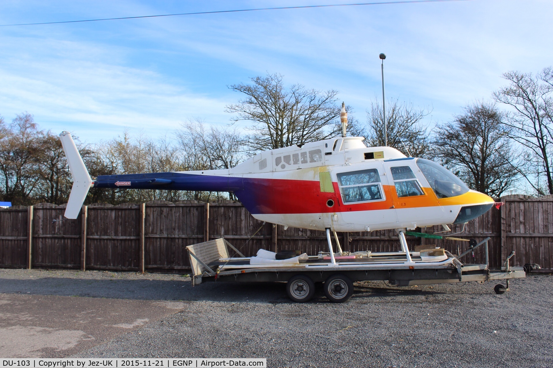 DU-103, 1973 Bell 206B JetRanger II C/N 1193, airframe parked on trailer at Coneypark heliport next to LBA in UK(EGNM) with rotors and parts missing, no identification and not totally confirmed to be c/n 1193,