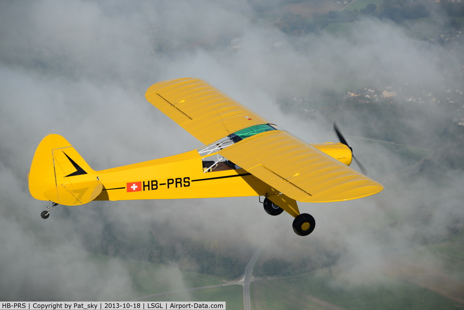HB-PRS, 1951 Piper L-18C Super Cub (PA-18-95) C/N 18-1010, In flight close to LSGL