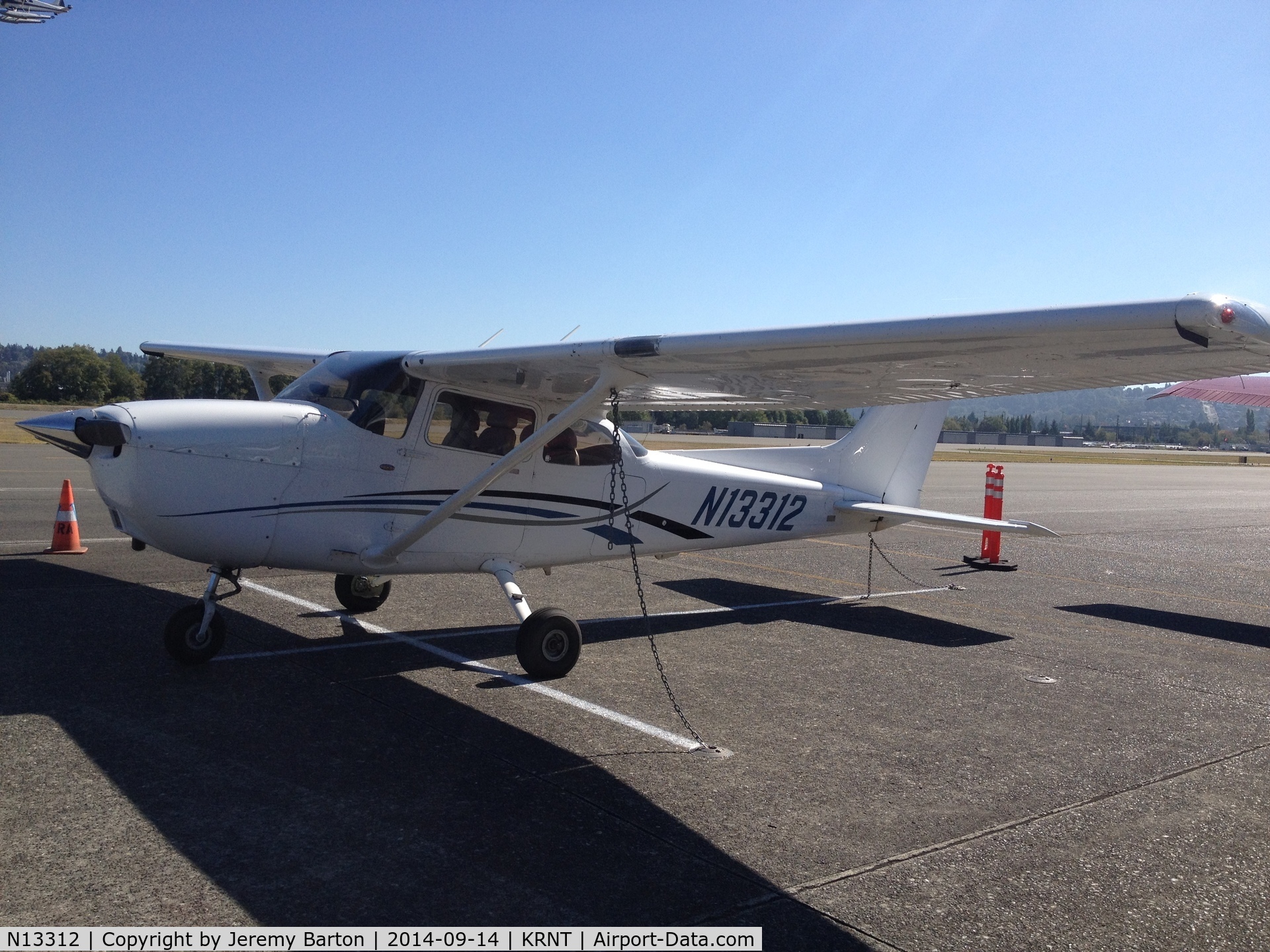 N13312, 2006 Cessna 172S C/N 172S10401, N13312 with tie-down chains still attached.
