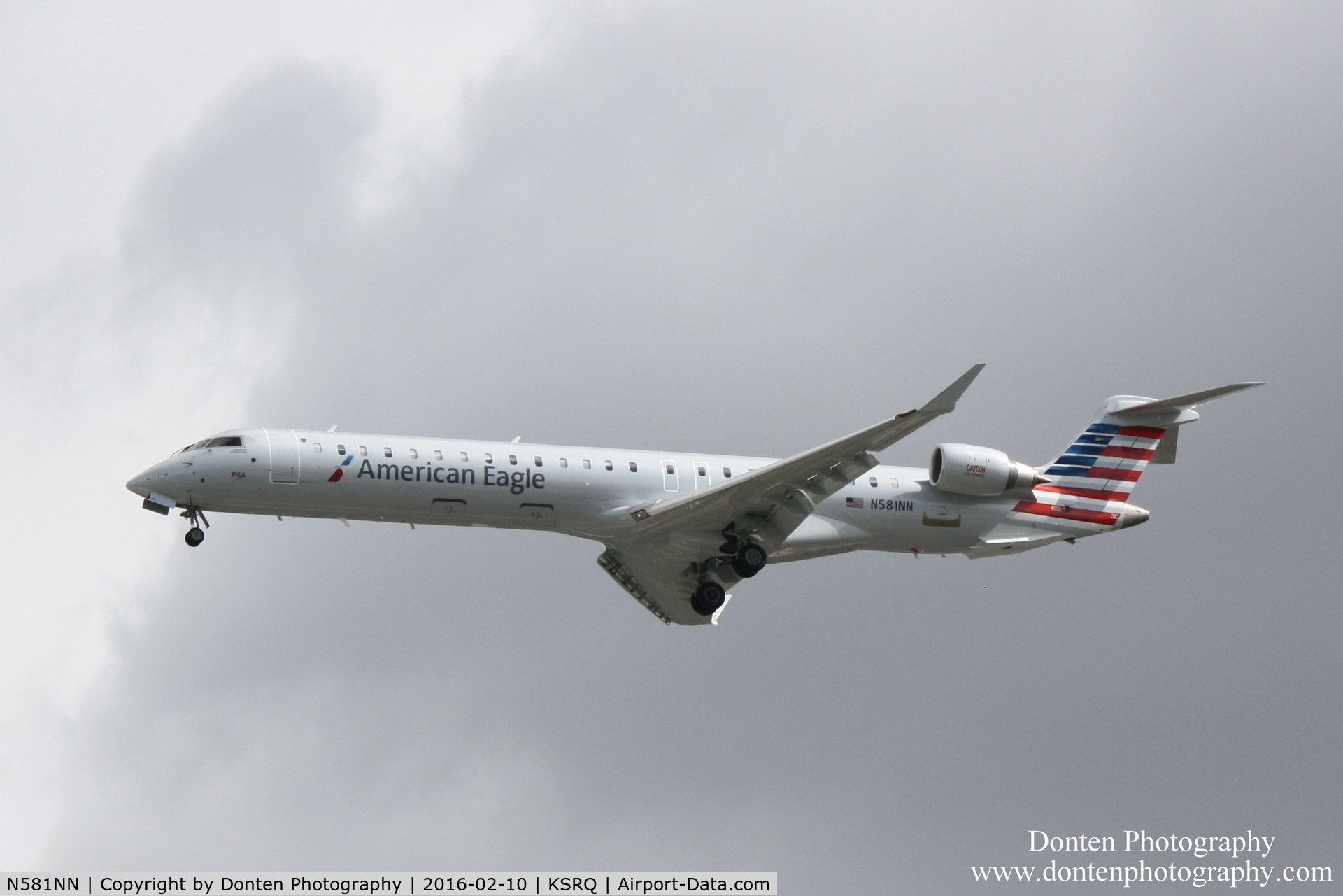 N581NN, 2015 Bombardier CRJ-900 (CL-600-2D24) C/N 15384, American Flight 5139 operated by PSA (N581NN) arrives at Sarasota-Bradenton International Airport following flight from Charlotte-Douglas International Airport
