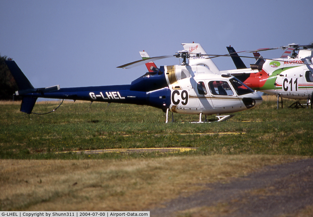 G-LHEL, 1990 Aerospatiale AS-355F-2 Ecureuil 2 C/N 5462, Parked at the héliport during French Formula One GP 2004...