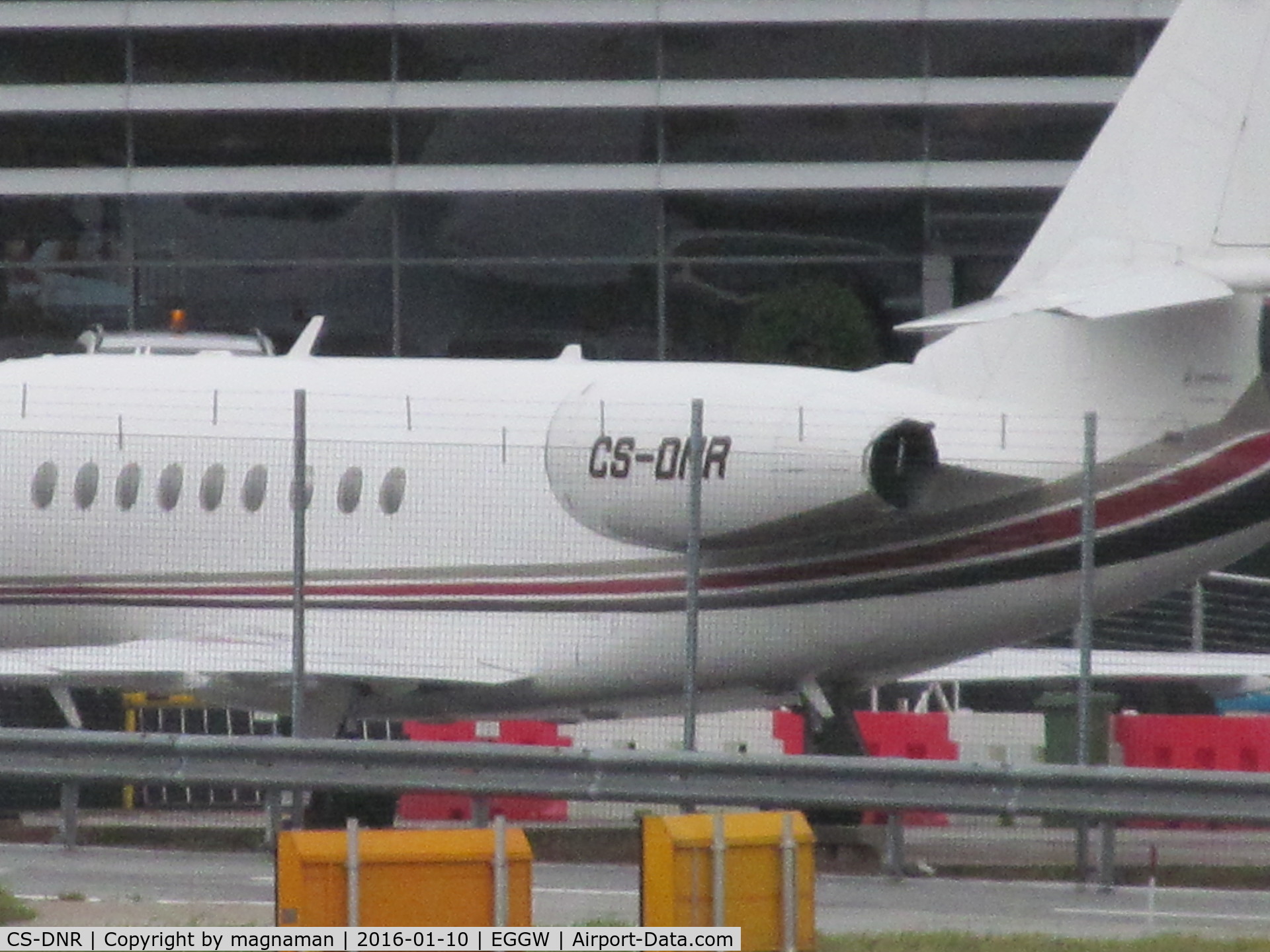 CS-DNR, 2000 Dassault Falcon 2000 C/N 120, long shot across apron