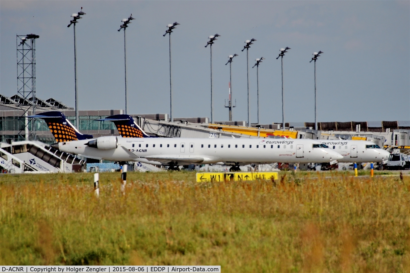 D-ACNR, 2011 Bombardier CRJ-900LR (CL-600-2D24) C/N 15263, Twins on apron 1 west....