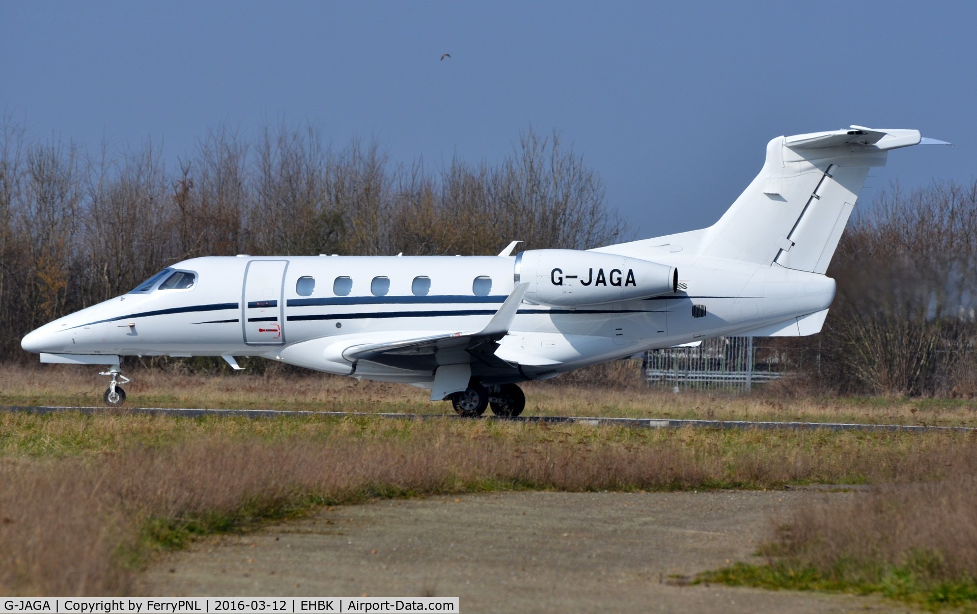 G-JAGA, 2013 Embraer EMB-505 Phenom 300 C/N 50500134, EMB505 backtracking for departure from MST.