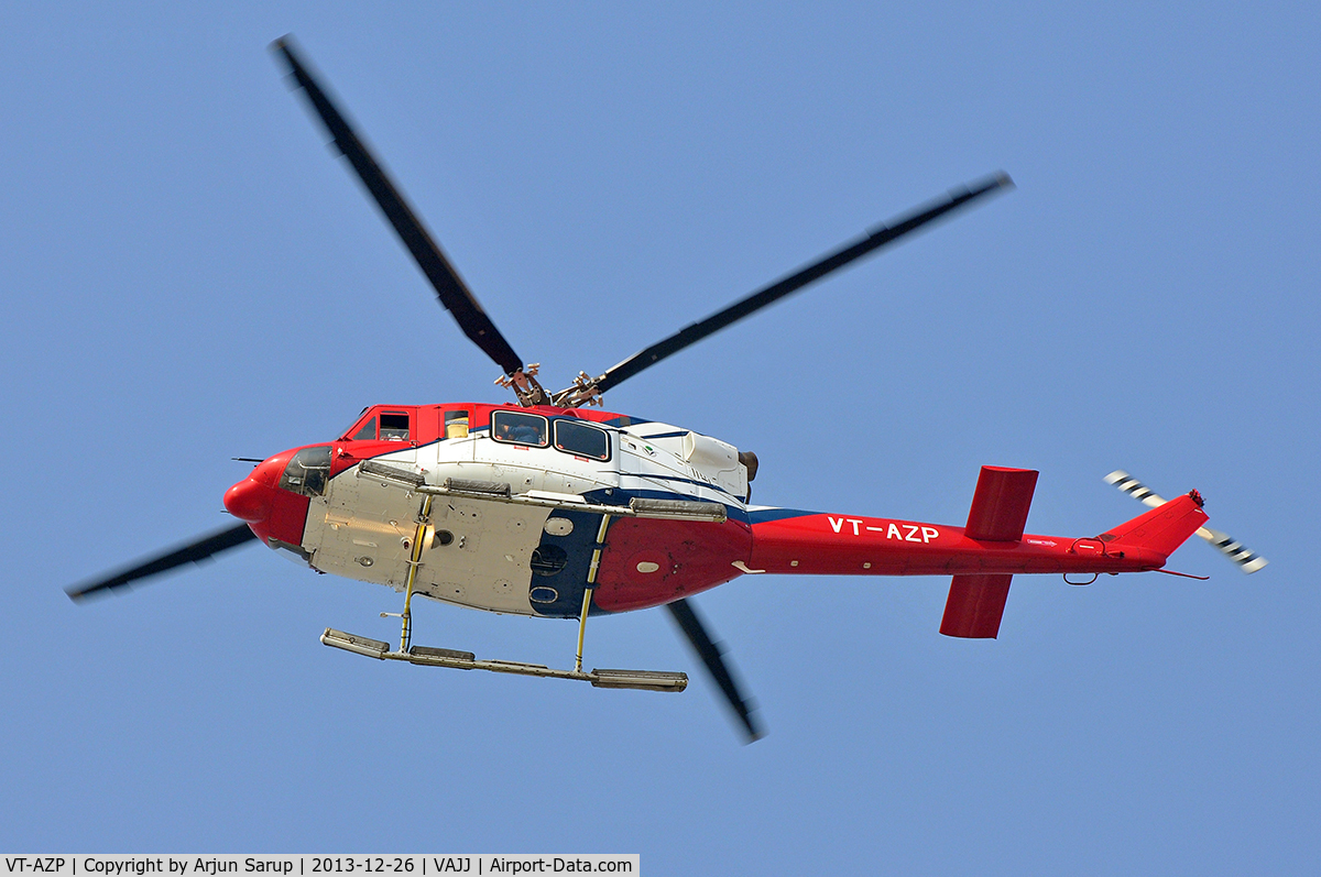 VT-AZP, 2006 Bell 412EP C/N 36407, Flying over Juhu beach.