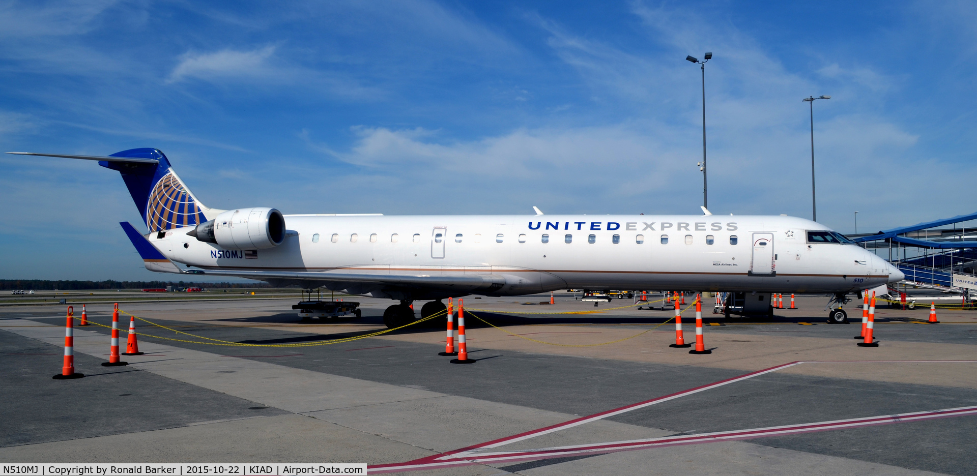 N510MJ, 2003 Bombardier CRJ-700 (CL-600-2C10) Regional Jet C/N 10101, At the gate Dulles