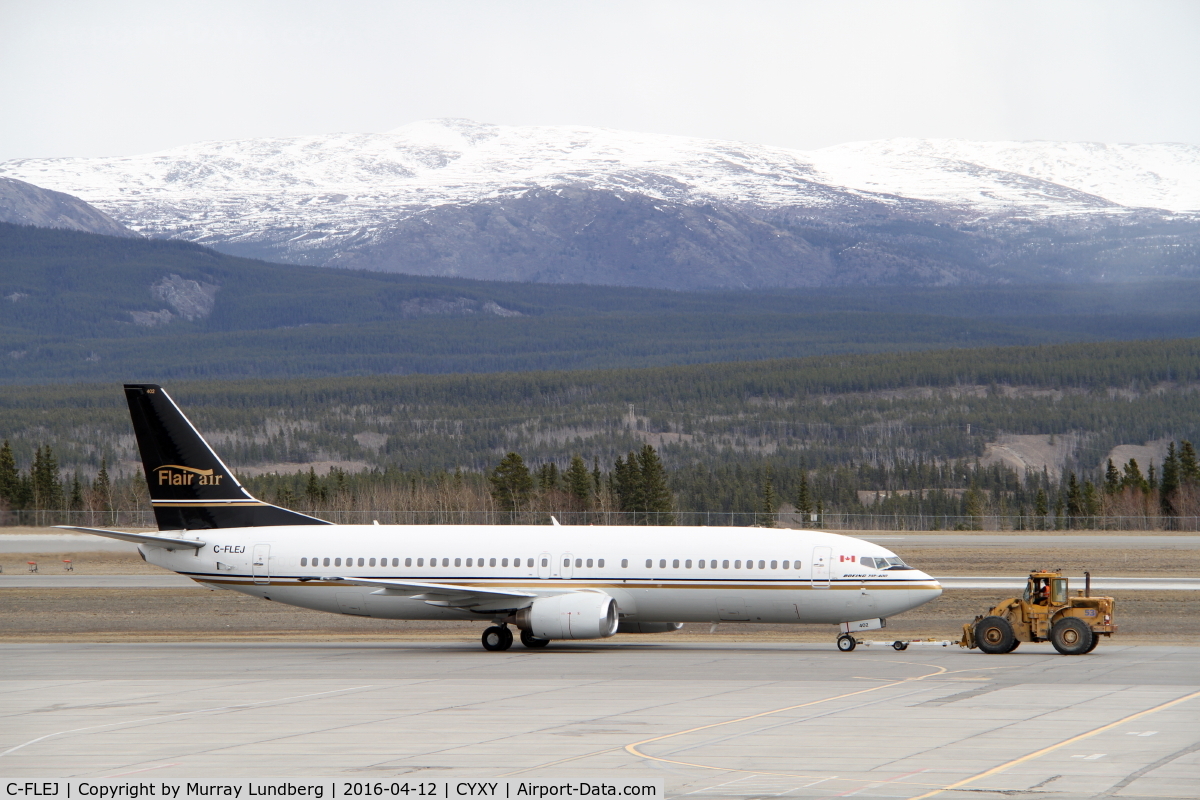 C-FLEJ, 1991 Boeing 737-4B3 C/N 24751, Under tow in Whitehorse, Yukon, while covering an Air North crew-move contract.