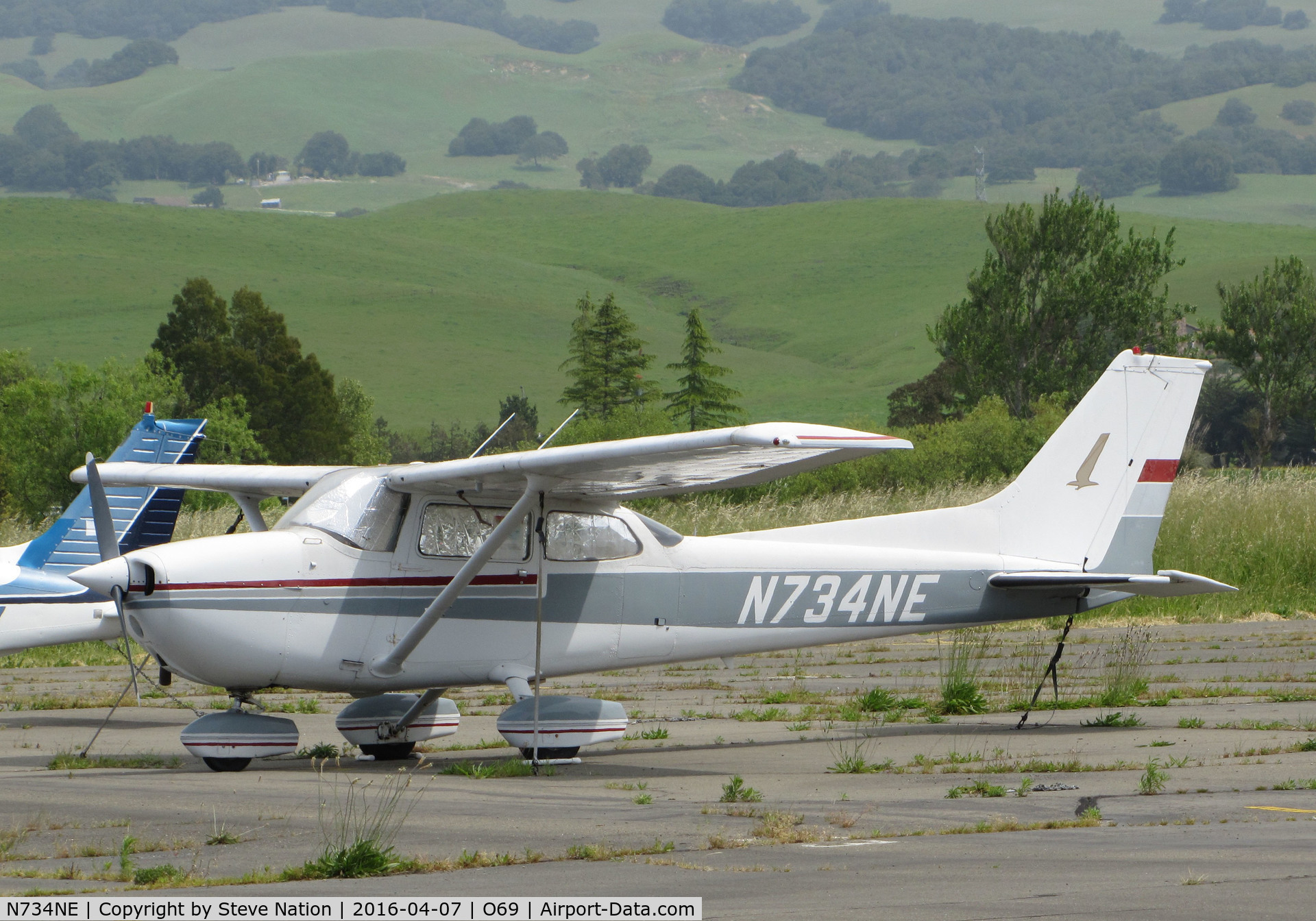 N734NE, 1977 Cessna 172N C/N 17268977, April 2016 After the Winter Rains Came! Locally-based 1977 Cessna 172N rests on the ramp @ Petaluma Municipal Airport, CA home base. Compare how the foothills look here with my October 2005 photo of the same aircraft, same location.