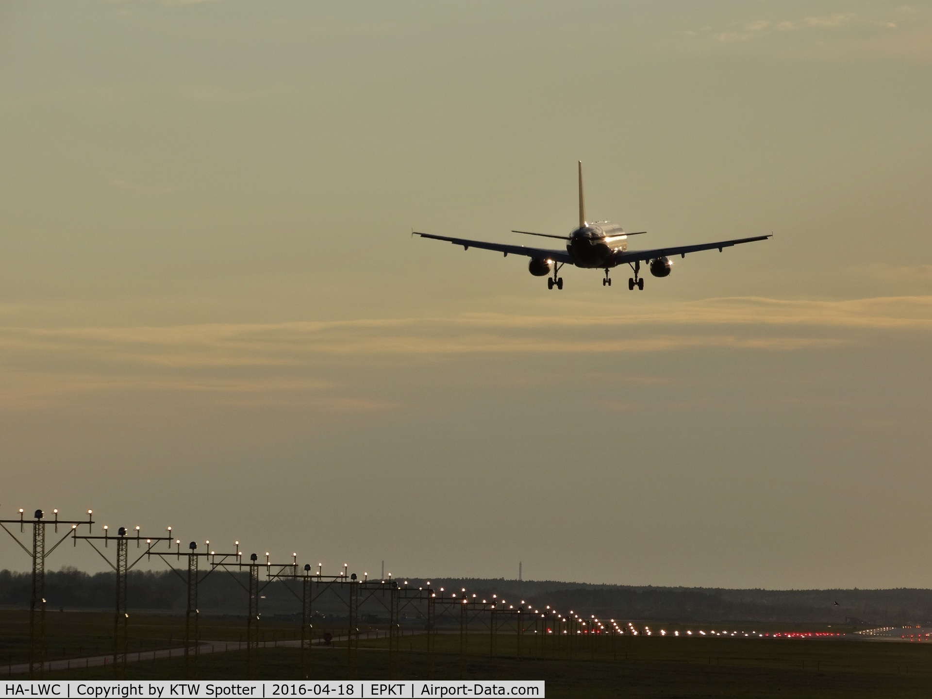 HA-LWC, 2010 Airbus A320-232 C/N 4323, Short final to RWY27 in sunset light.