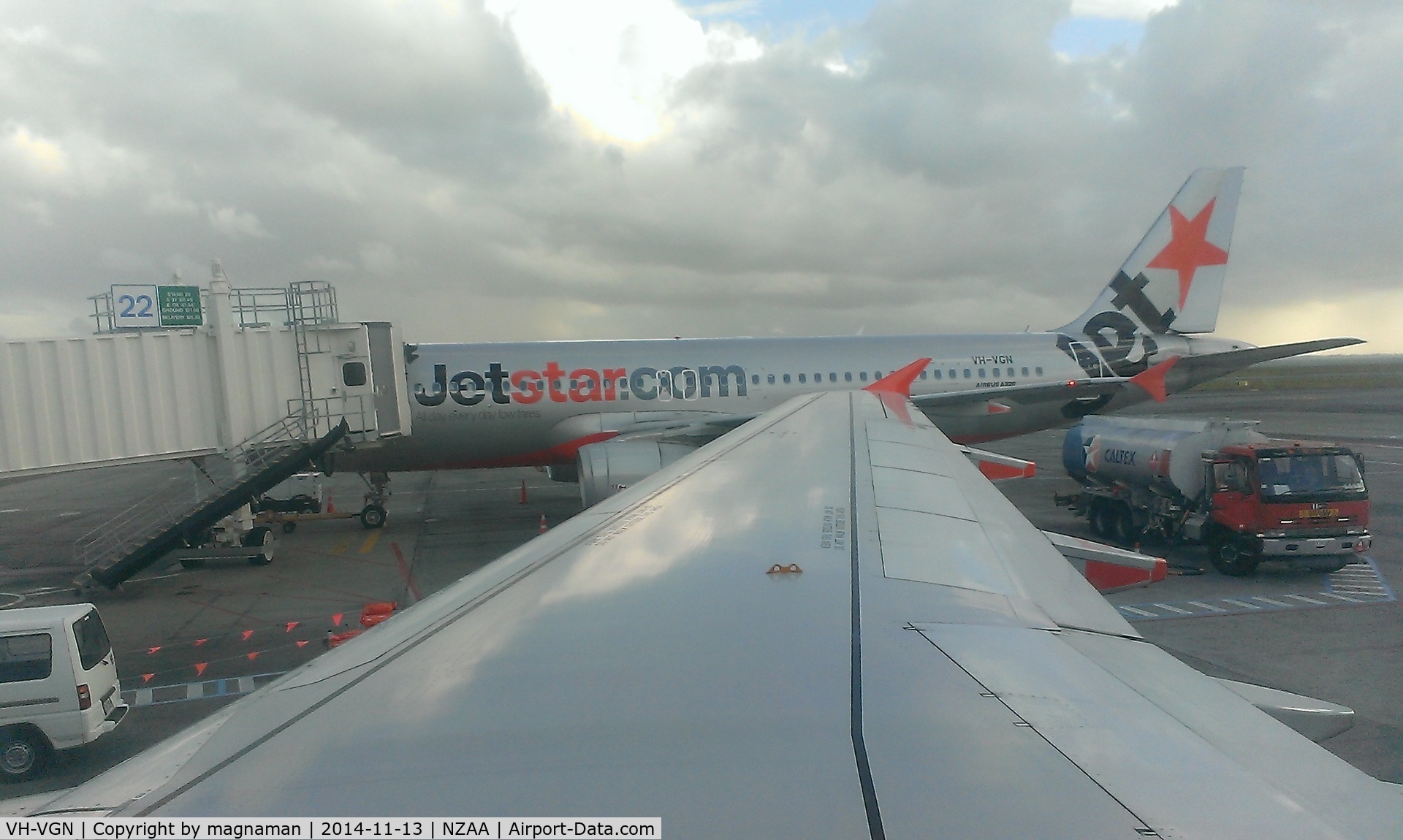 VH-VGN, 2010 Airbus A320-232 C/N 4434, on AKL tarmac - viewed from sister ship