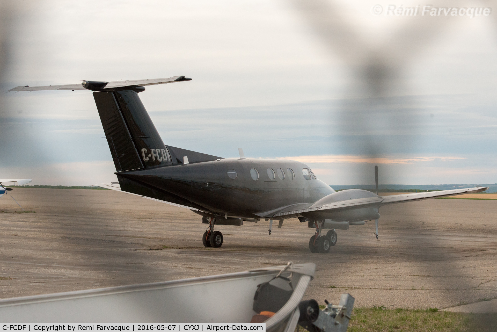 C-FCDF, 1980 Beech F90 King Air C/N LA-81, In new livery since last photographed. Parked north of control tower.