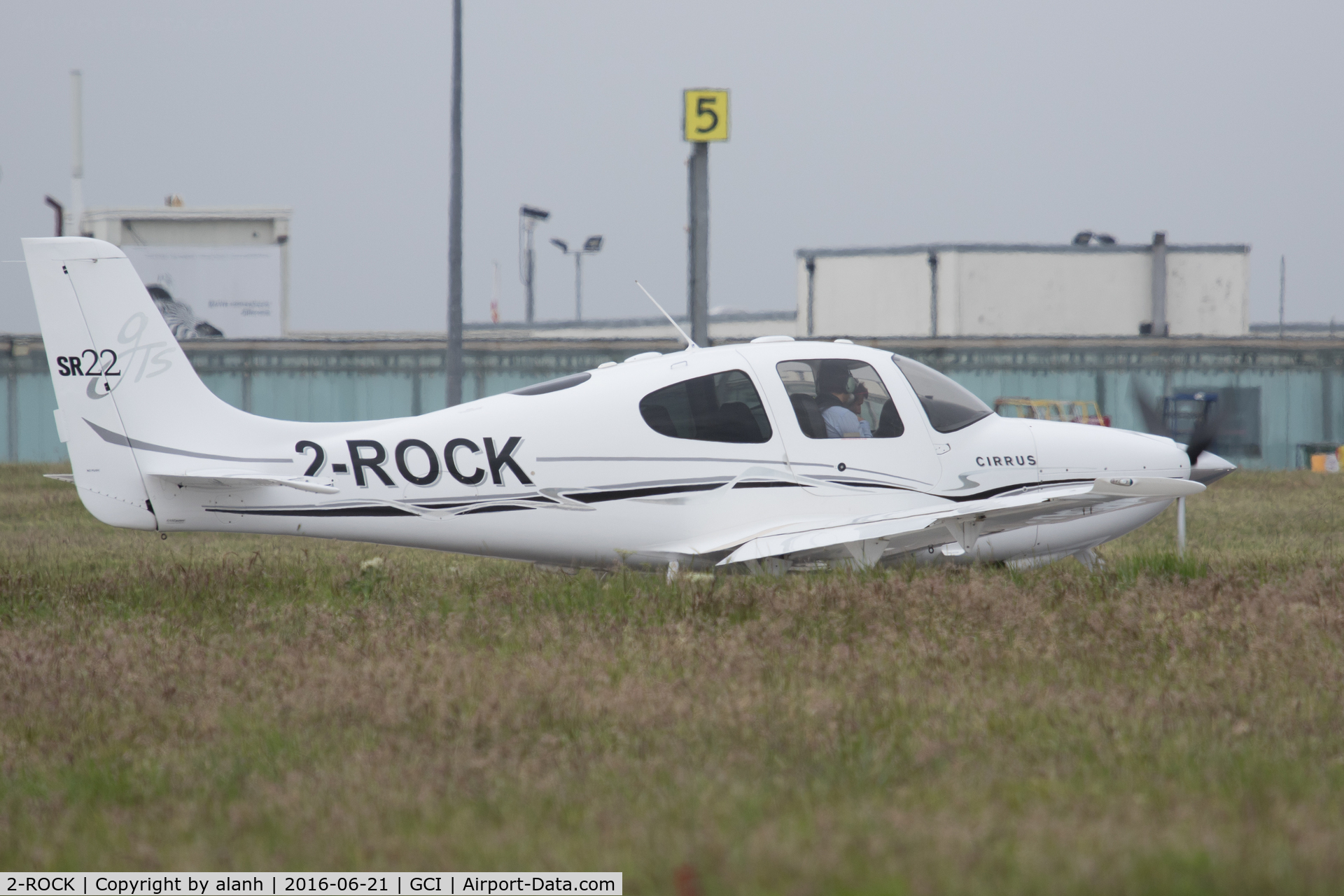 2-ROCK, 2005 Cirrus SR22 GTS C/N 1313, Lined up ready for a 27 departure - shame about the long grass...
