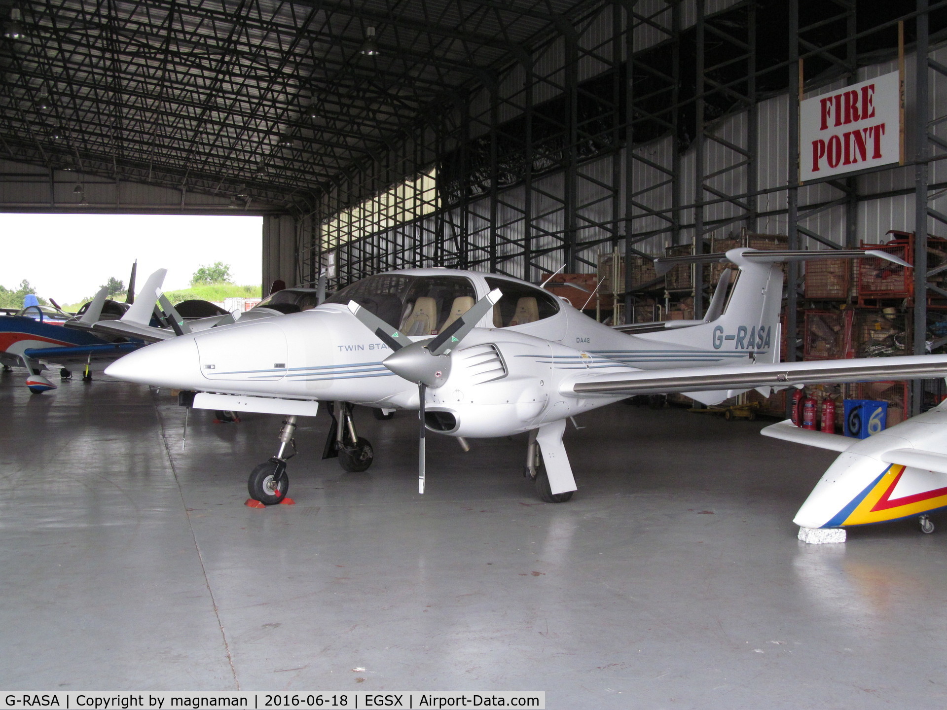 G-RASA, 2006 Diamond DA-42 Twin Star C/N 42.144, in home hangar