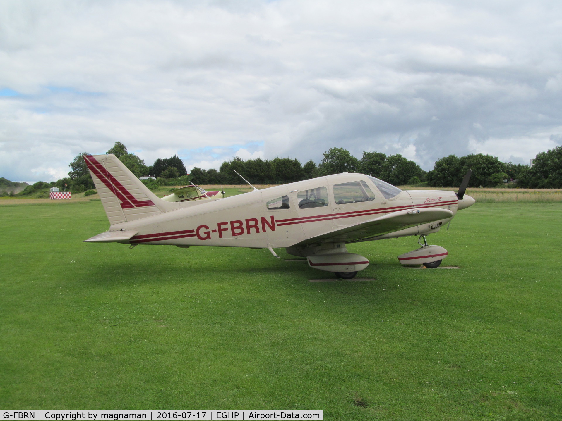 G-FBRN, 1982 Piper PA-28-181 Cherokee Archer II C/N 28-8290166, on grass area at popham